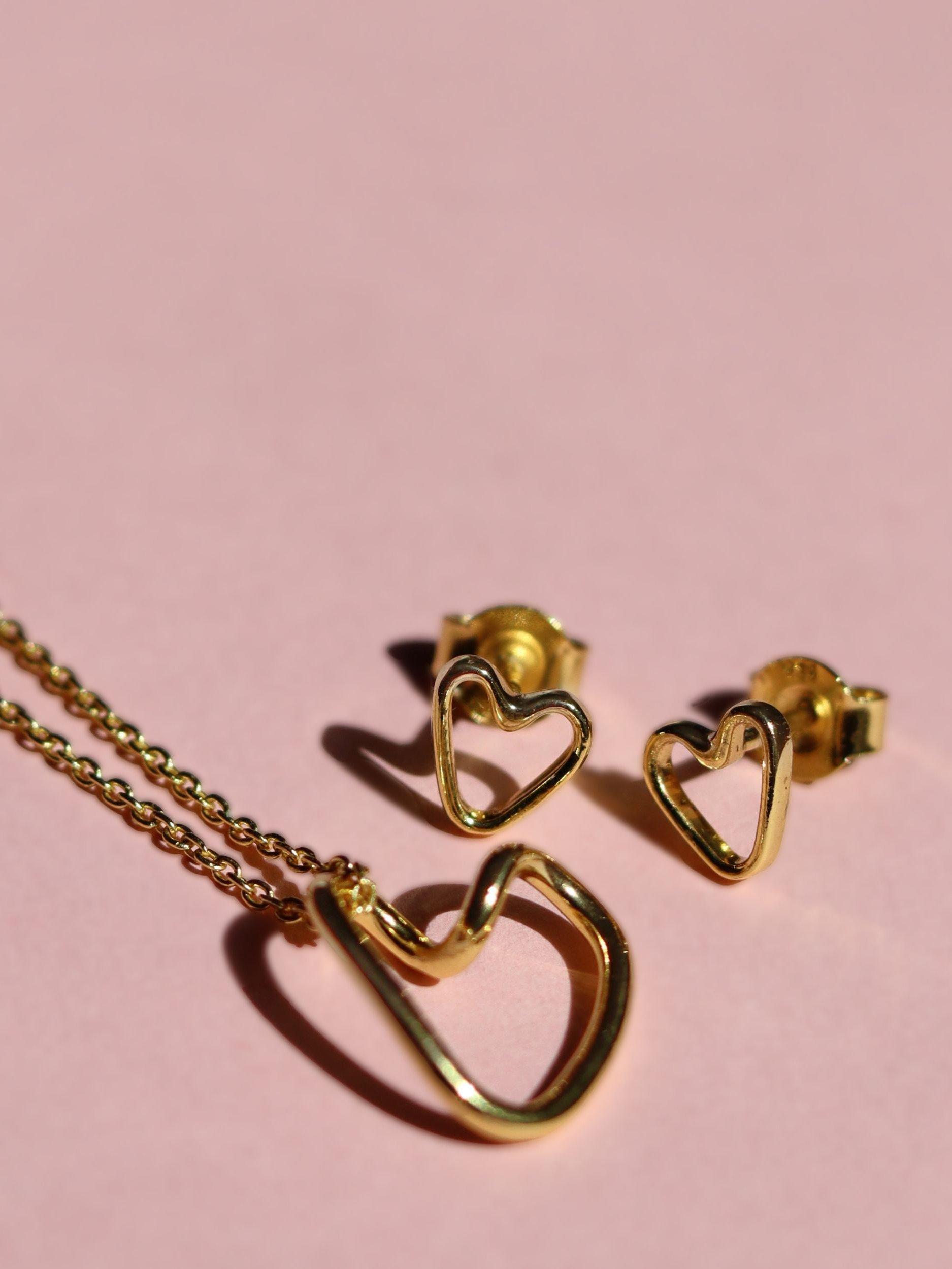 Product image 5 of 7, which shows Ottoman Hands Heart Stud Earrings, Gold