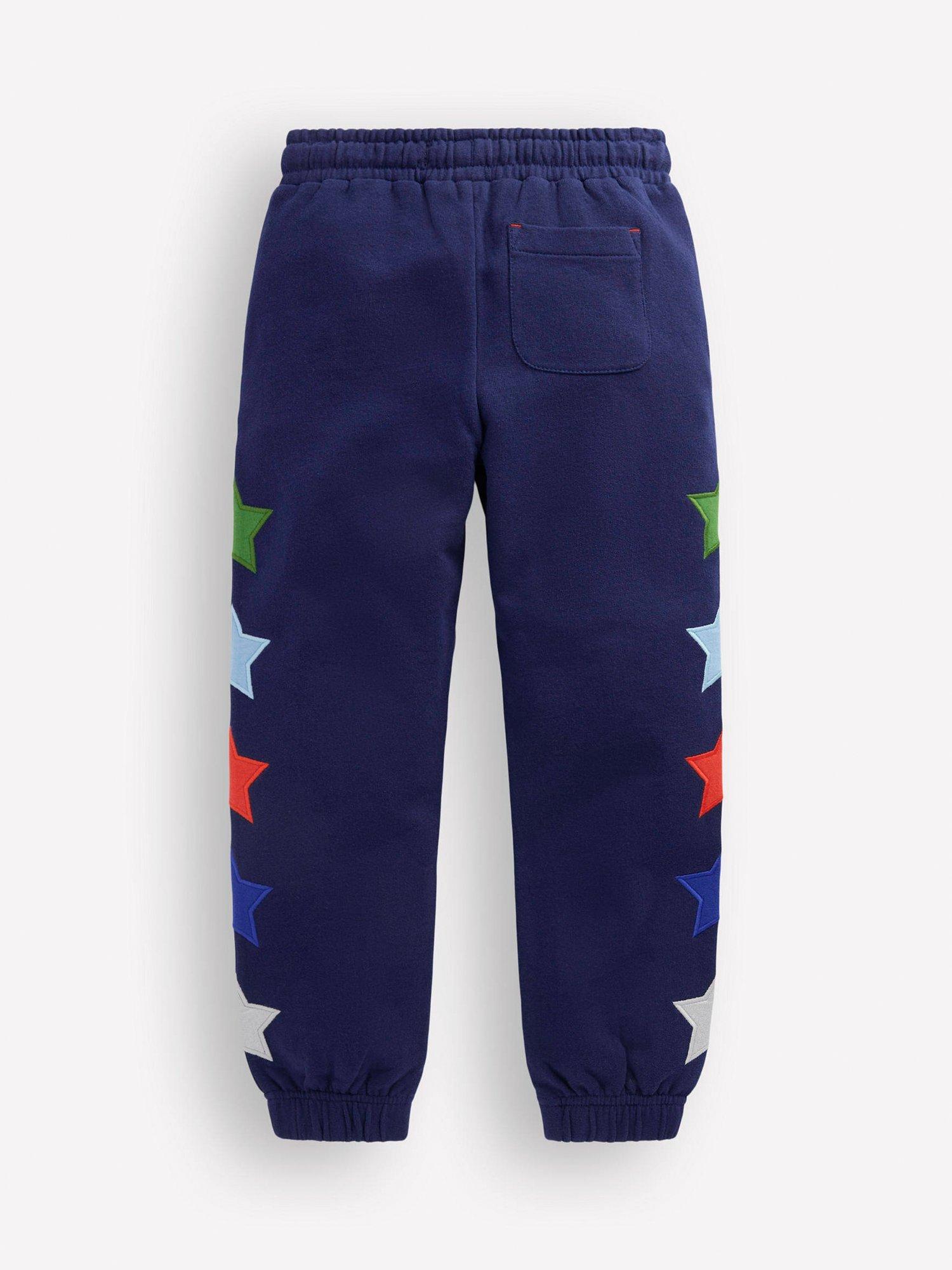Product image 2 of 3, which shows Mini Boden Kids' Cotton Applique Drawstring Joggers, Star Side, 2-3 years