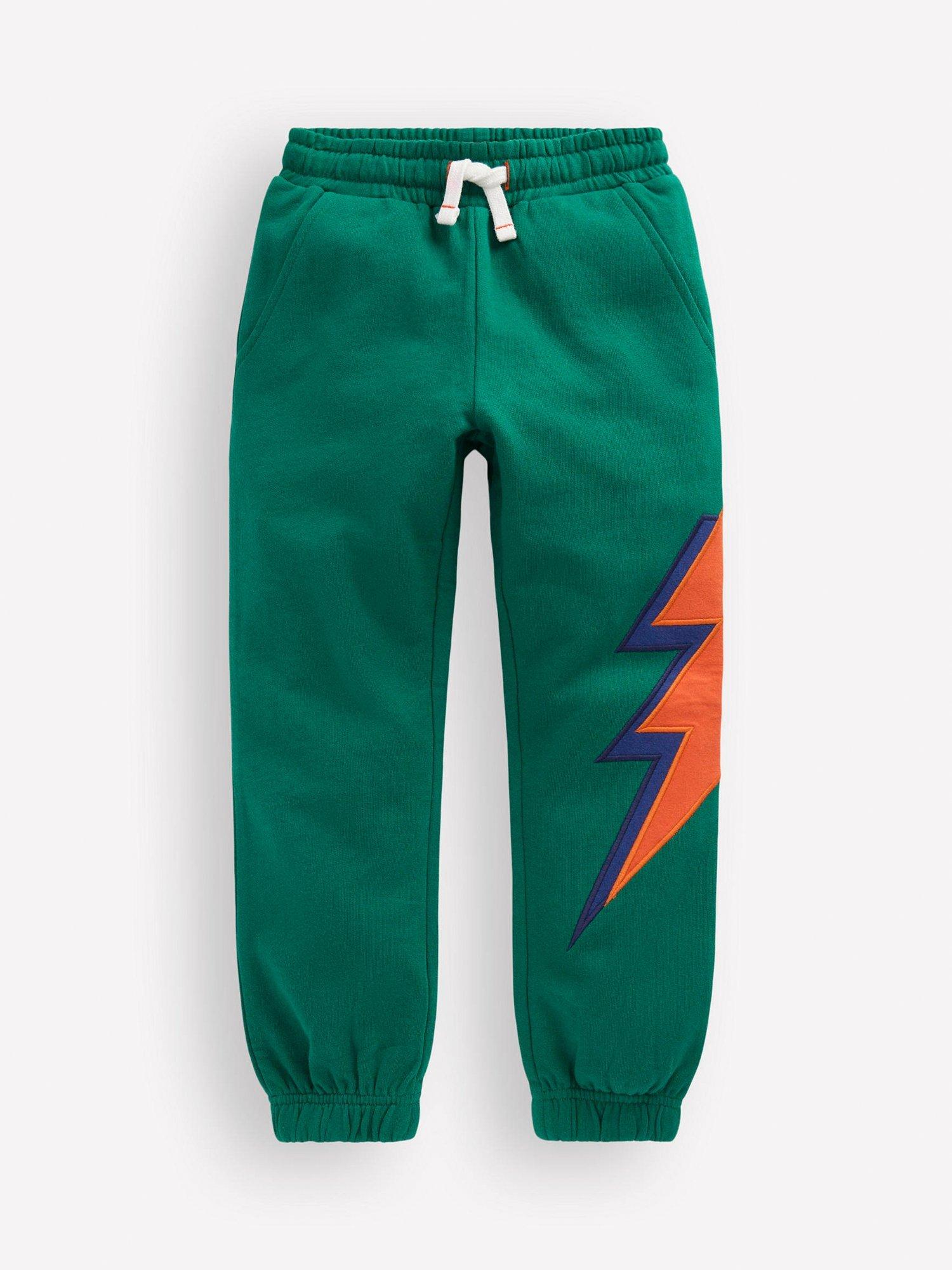 Product image 1 of 3, which shows Mini Boden Kids' Cotton Applique Drawstring Joggers, Lightning Bolt, 3-4 years