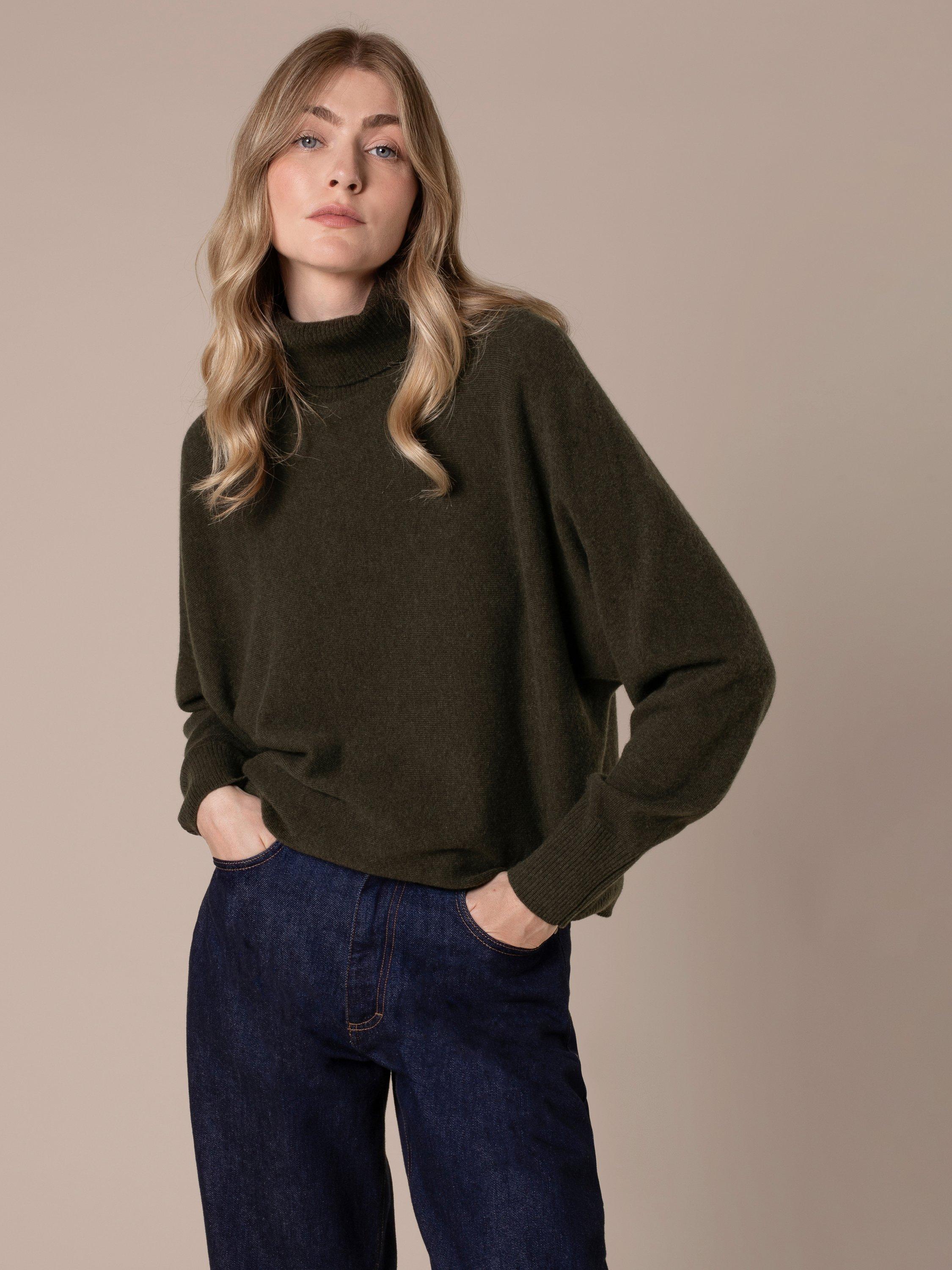 Product image 1 of 8, which shows Celtic & Co. Roll Neck Drop Sleeve Pure Wool Jumper, Olive, XS
