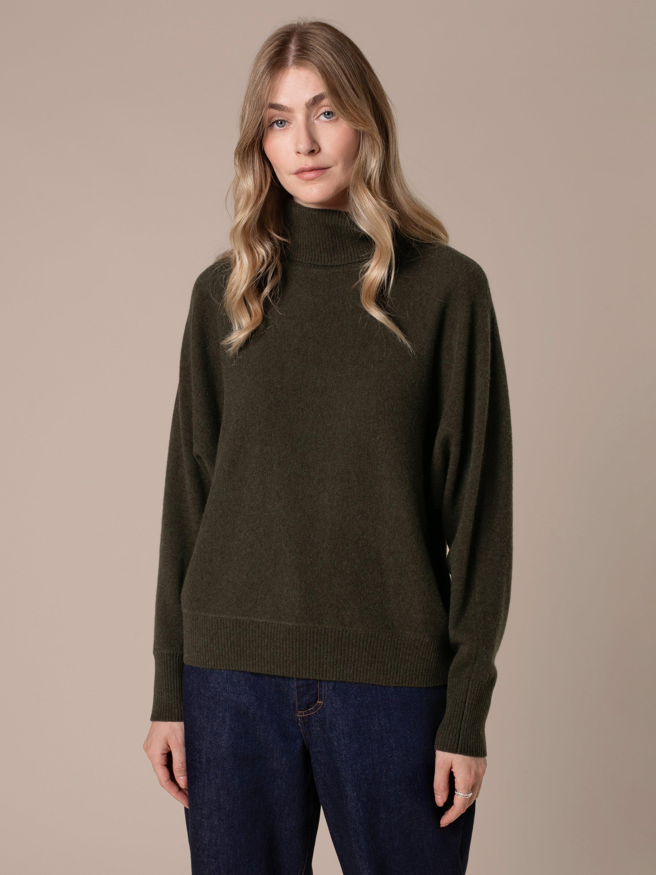Product image 2 of 8, which shows Celtic & Co. Roll Neck Drop Sleeve Pure Wool Jumper, Olive, XS