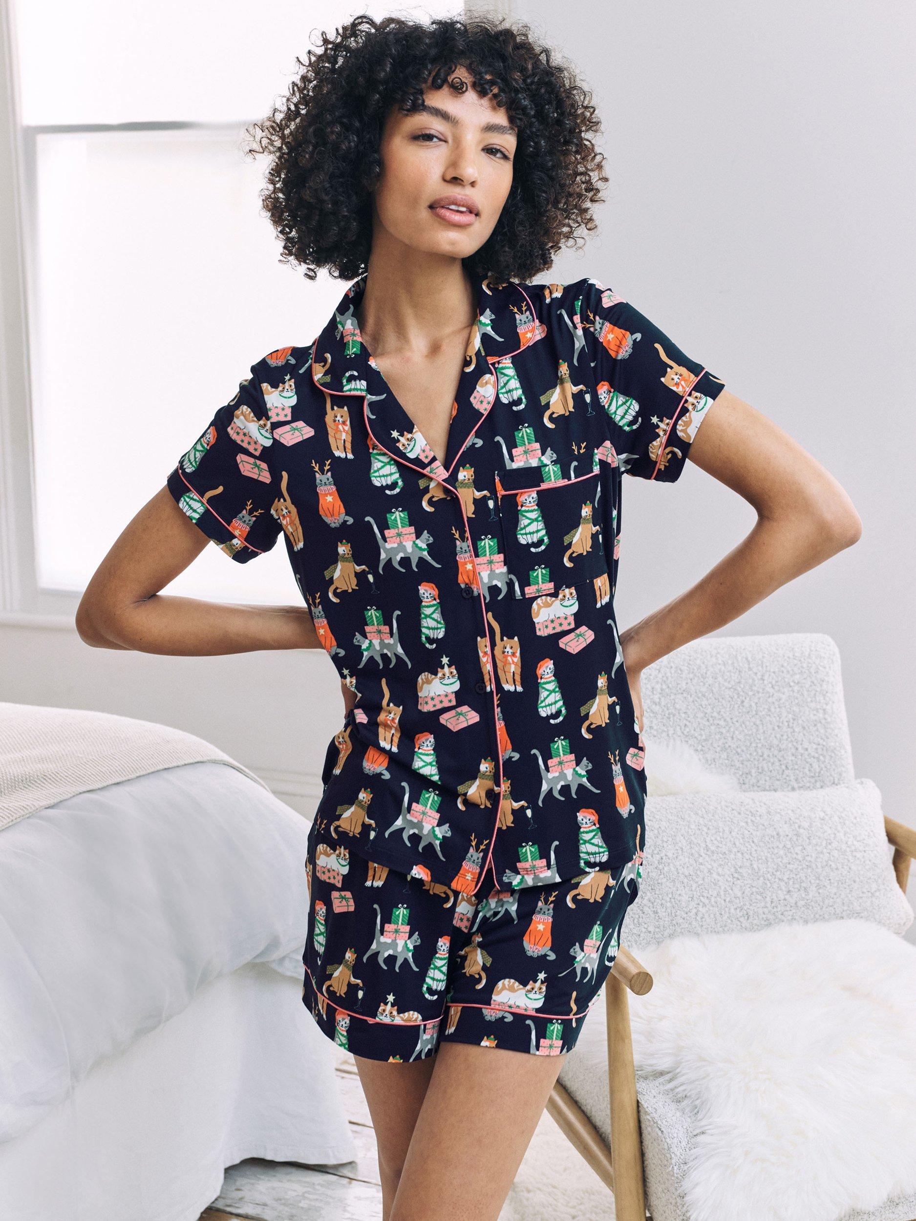 Product image 1 of 8, which shows Chelsea Peers Christmas Cats Button Through Short Pyjama Set, Navy, 10