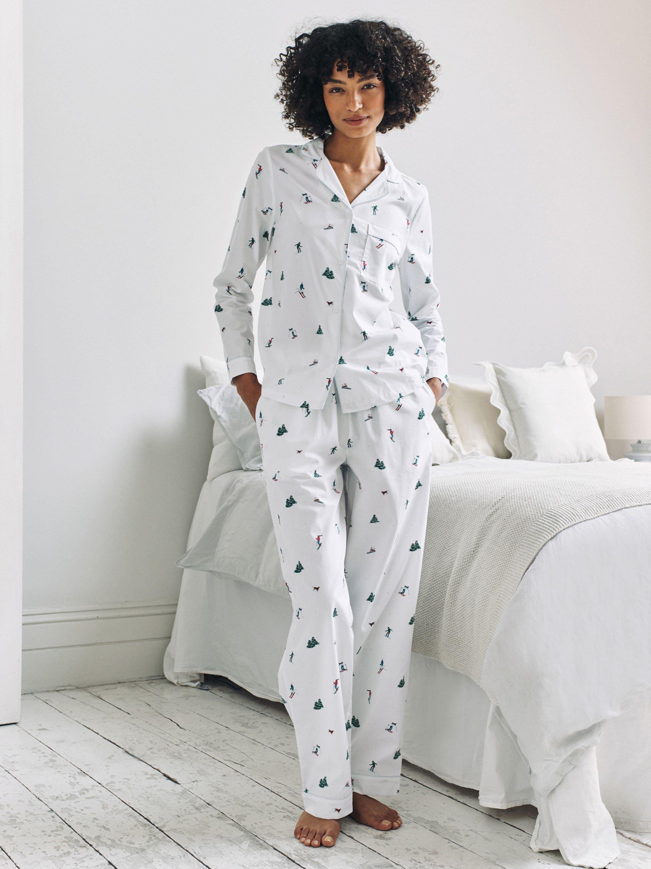 Product image 1 of 7, which shows Chelsea Peers Ski Holiday Button Through Long Pyjama Set, White, 10