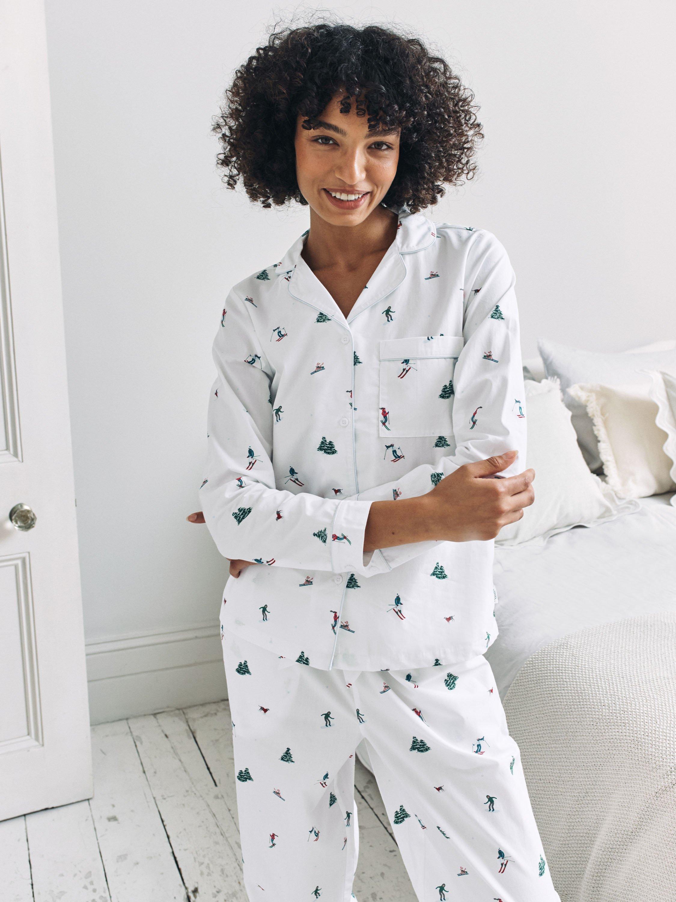 Product image 2 of 7, which shows Chelsea Peers Ski Holiday Button Through Long Pyjama Set, White, 10