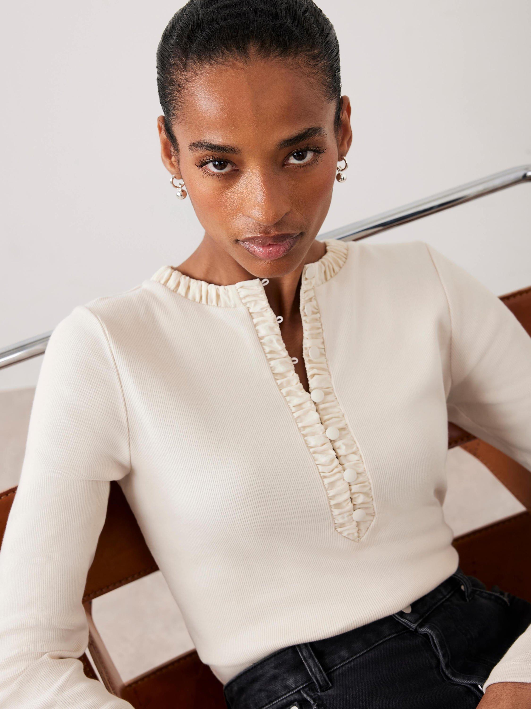 Product image 5 of 8, which shows Mint Velvet Cotton Blend Henley Long Sleeve Button Neck Top, Natural, XS