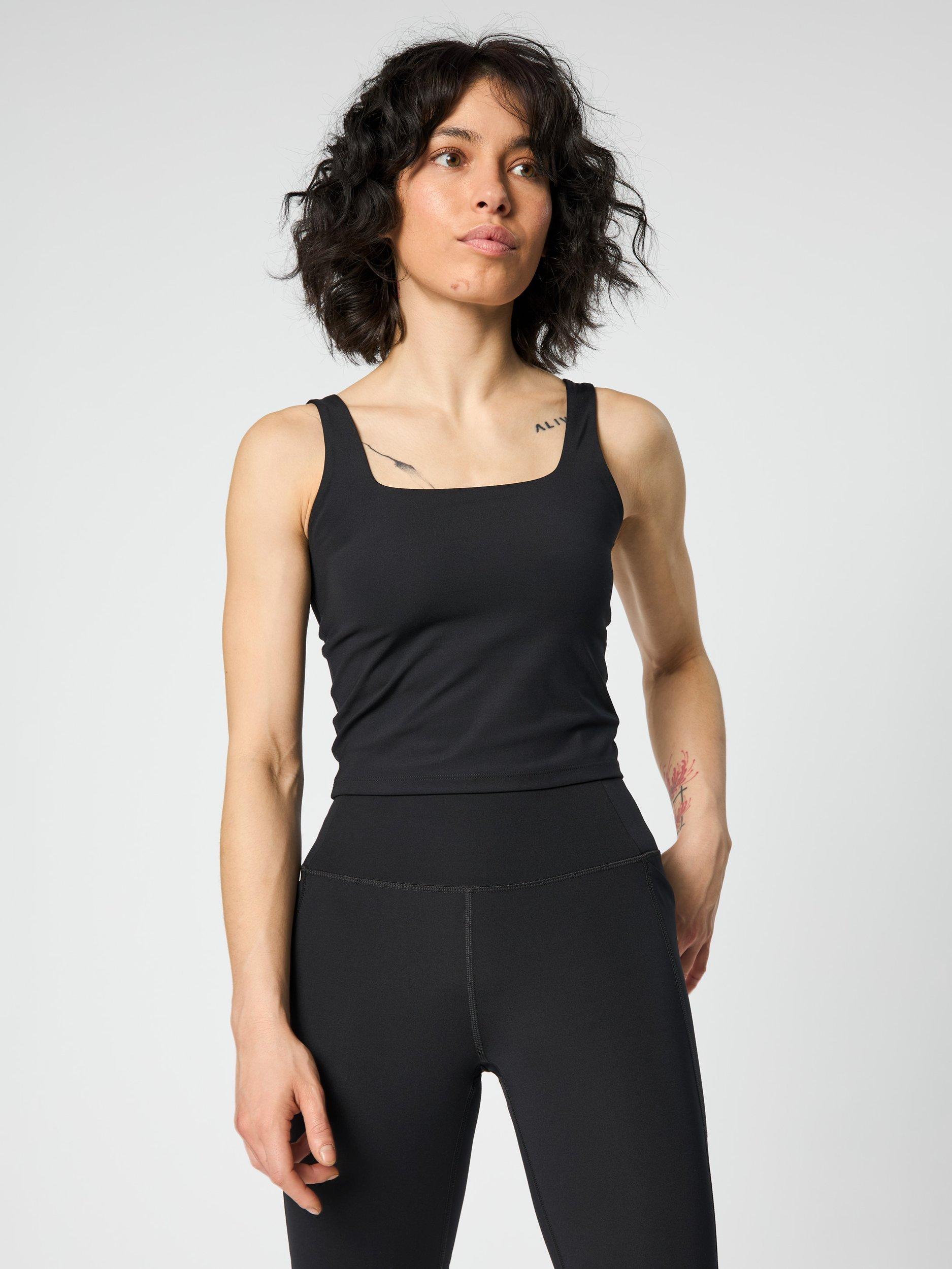 Product image 1 of 8, which shows Girlfriend Collective Tommy Tank Top, Black, XS