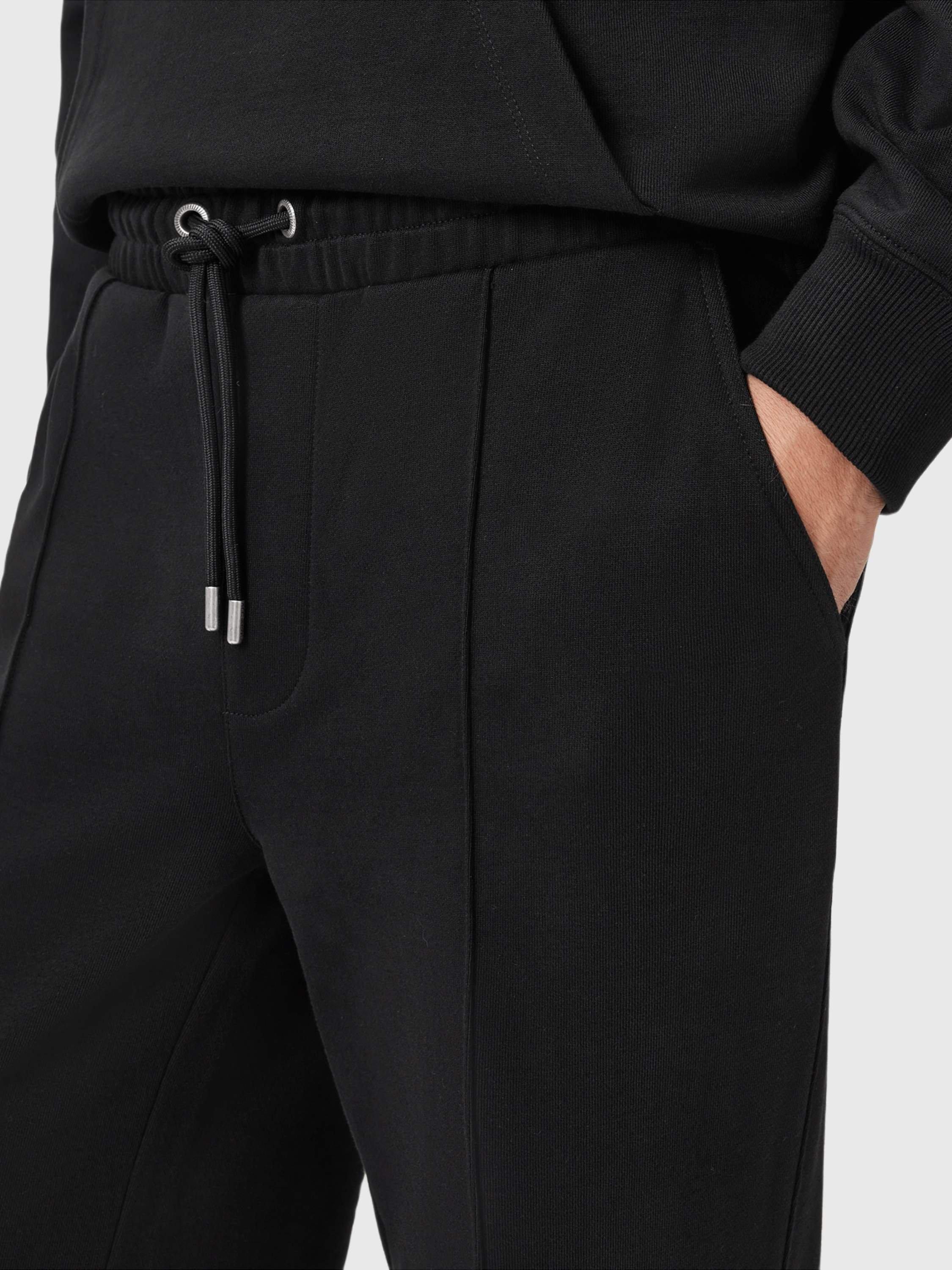 Product image 5 of 8, which shows AllSaints Milo Cotton Joggers, Jet Black, L