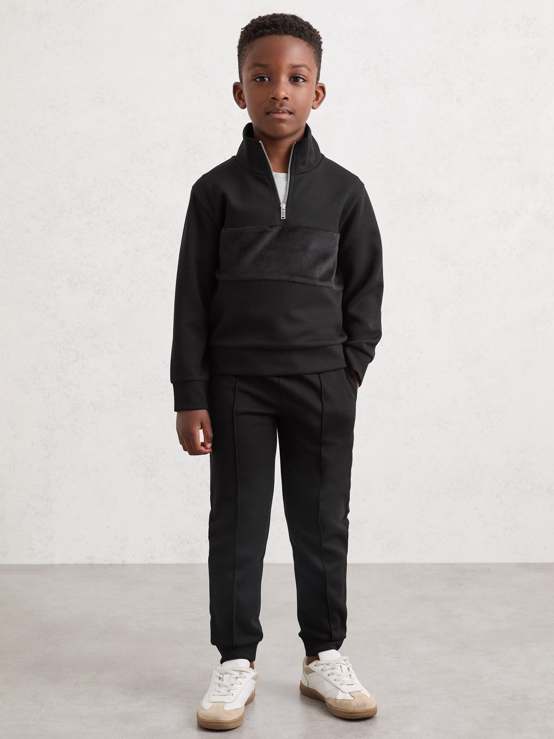 Product image 2 of 4, which shows Reiss Kids' Premier Tapered Drawstring Joggers, Black, 3-4 years