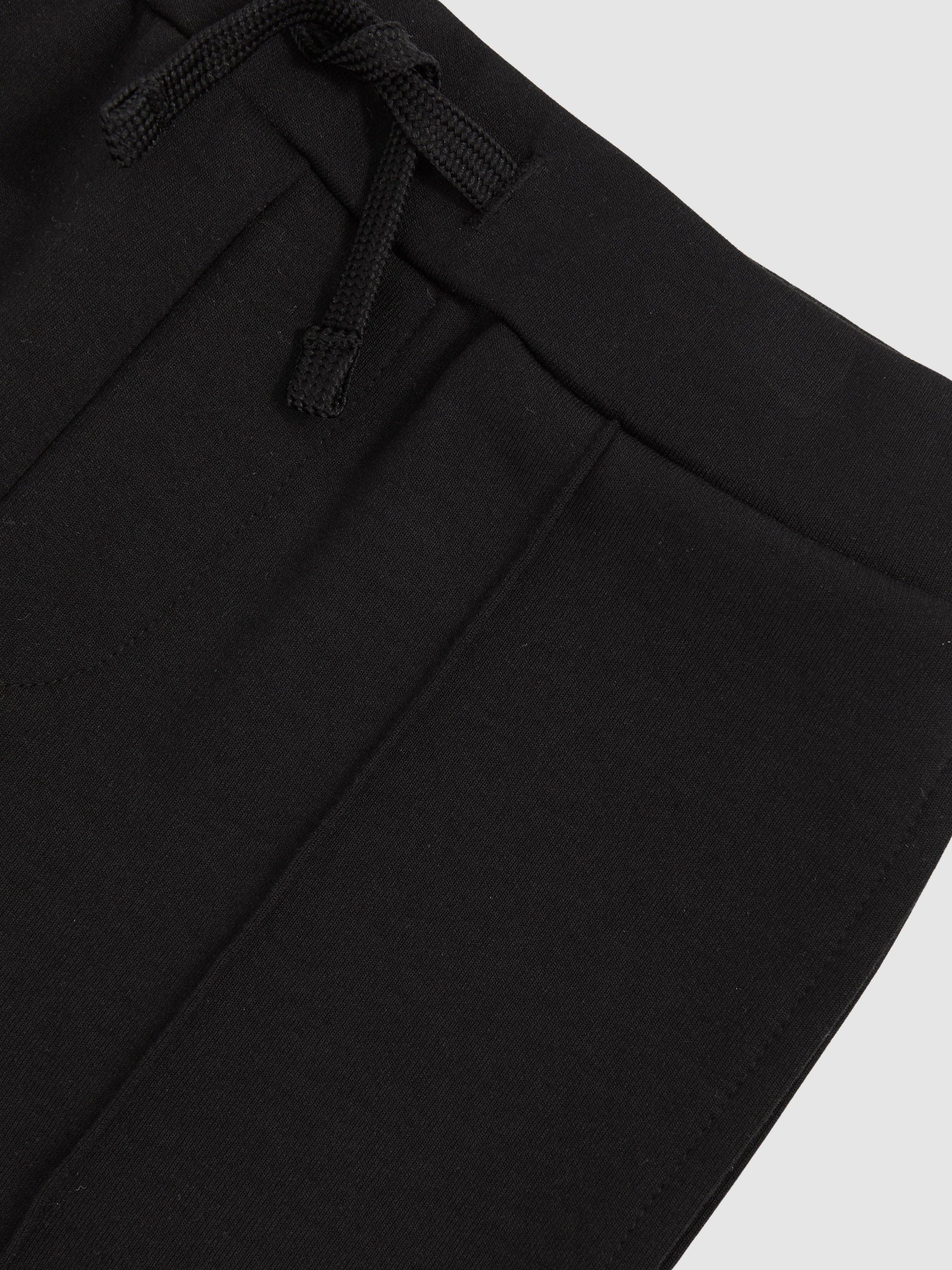 Product image 4 of 4, which shows Reiss Kids' Premier Tapered Drawstring Joggers, Black, 3-4 years
