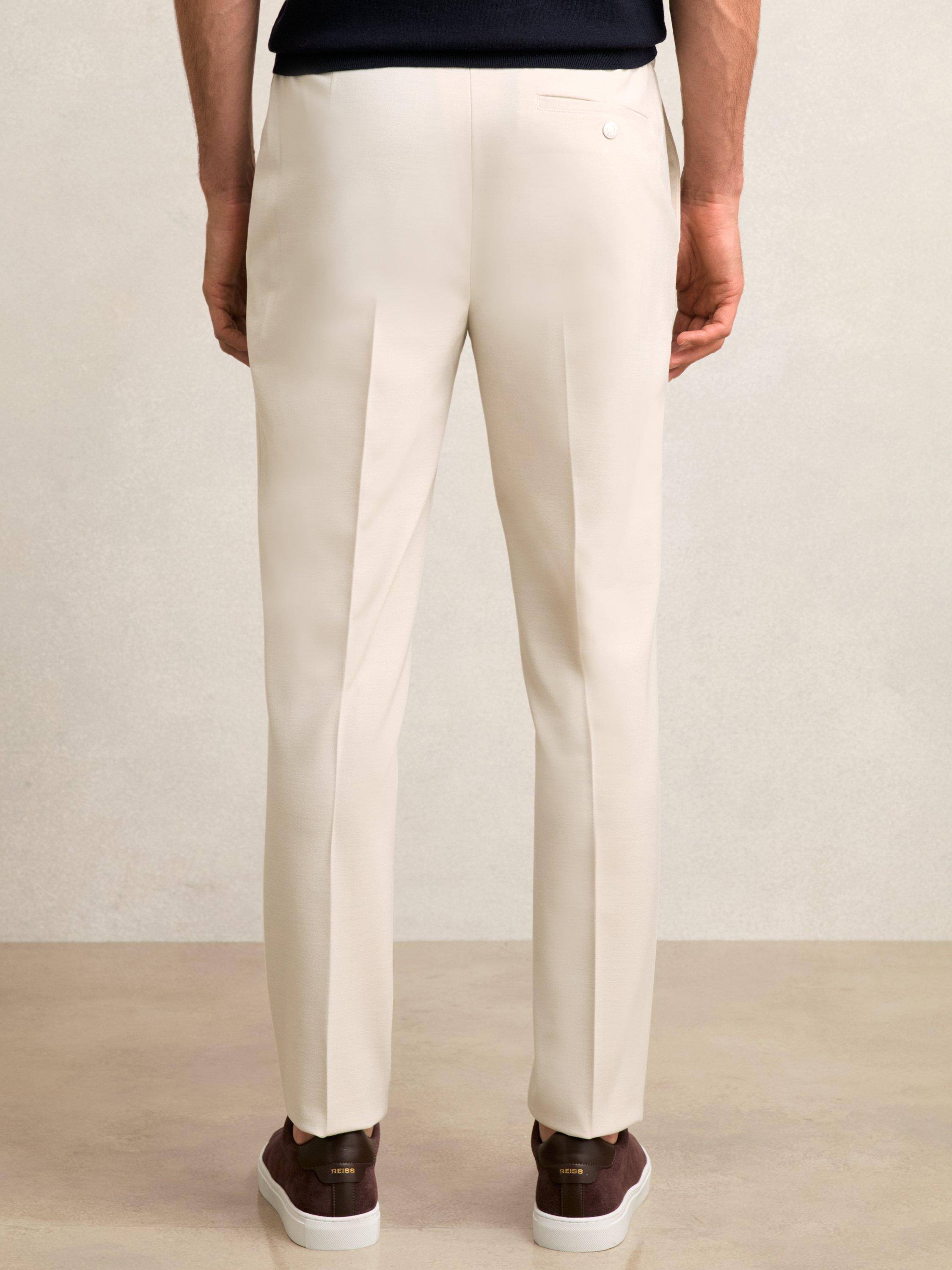 Product image 2 of 5, which shows Reiss Found Tapered Trousers, Stone, 28R