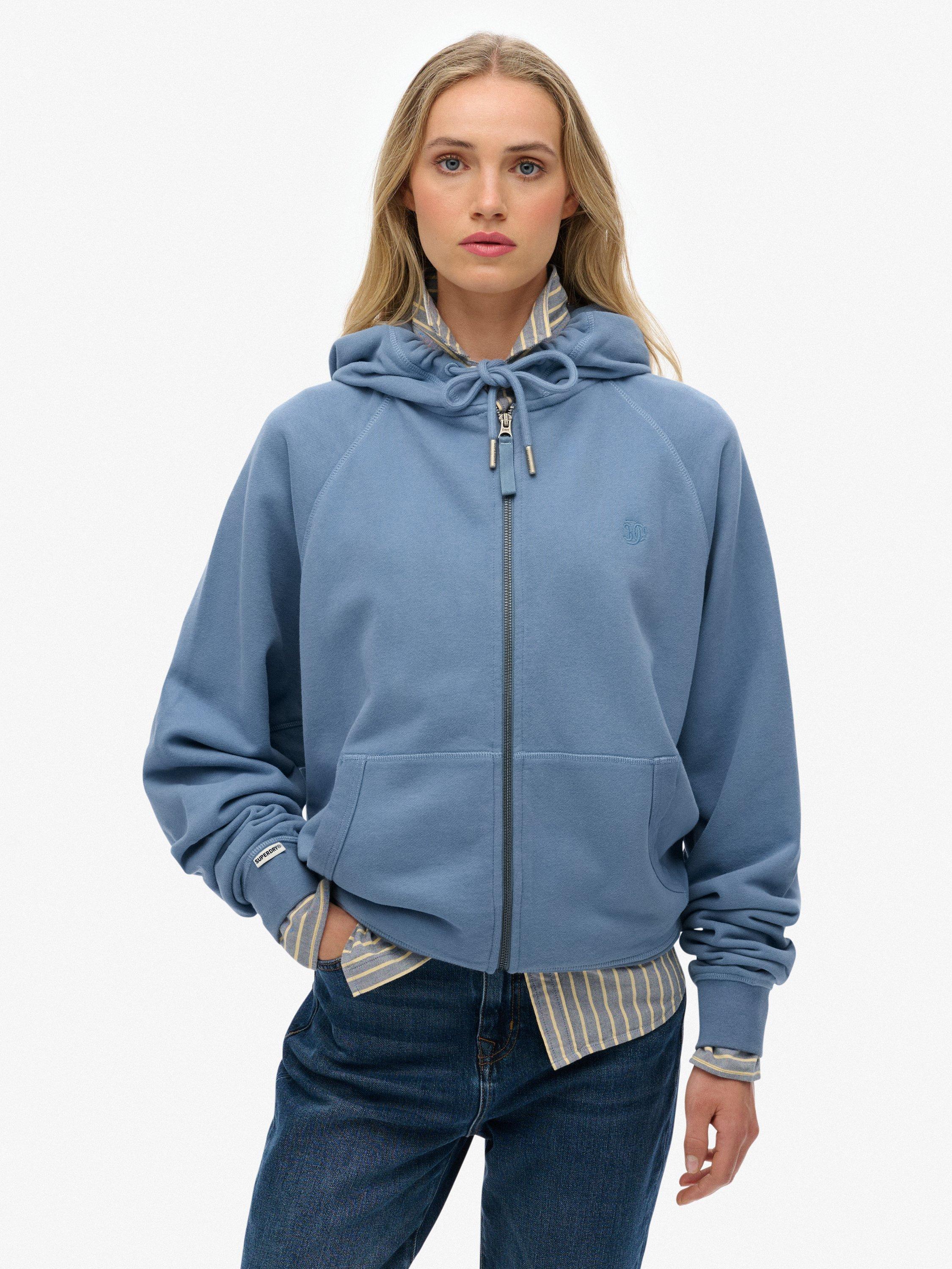 Product image 1 of 6, which shows Superdry Studios Relaxed Zip Hoodie, Tidal Blue, 16