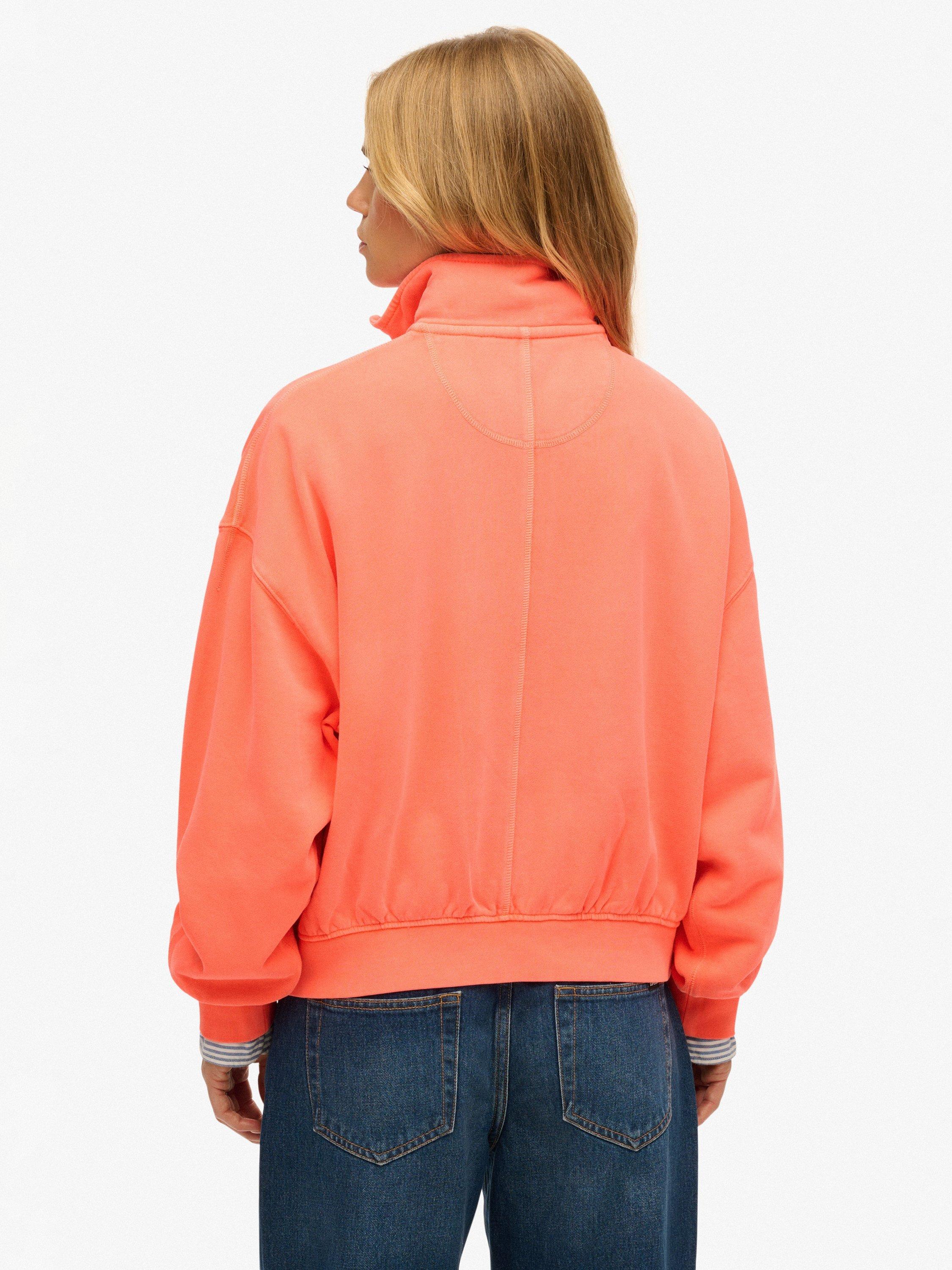 Product image 2 of 6, which shows Superdry Studios 1/2 Zip Sweatshirt, Fluro Coral, 16
