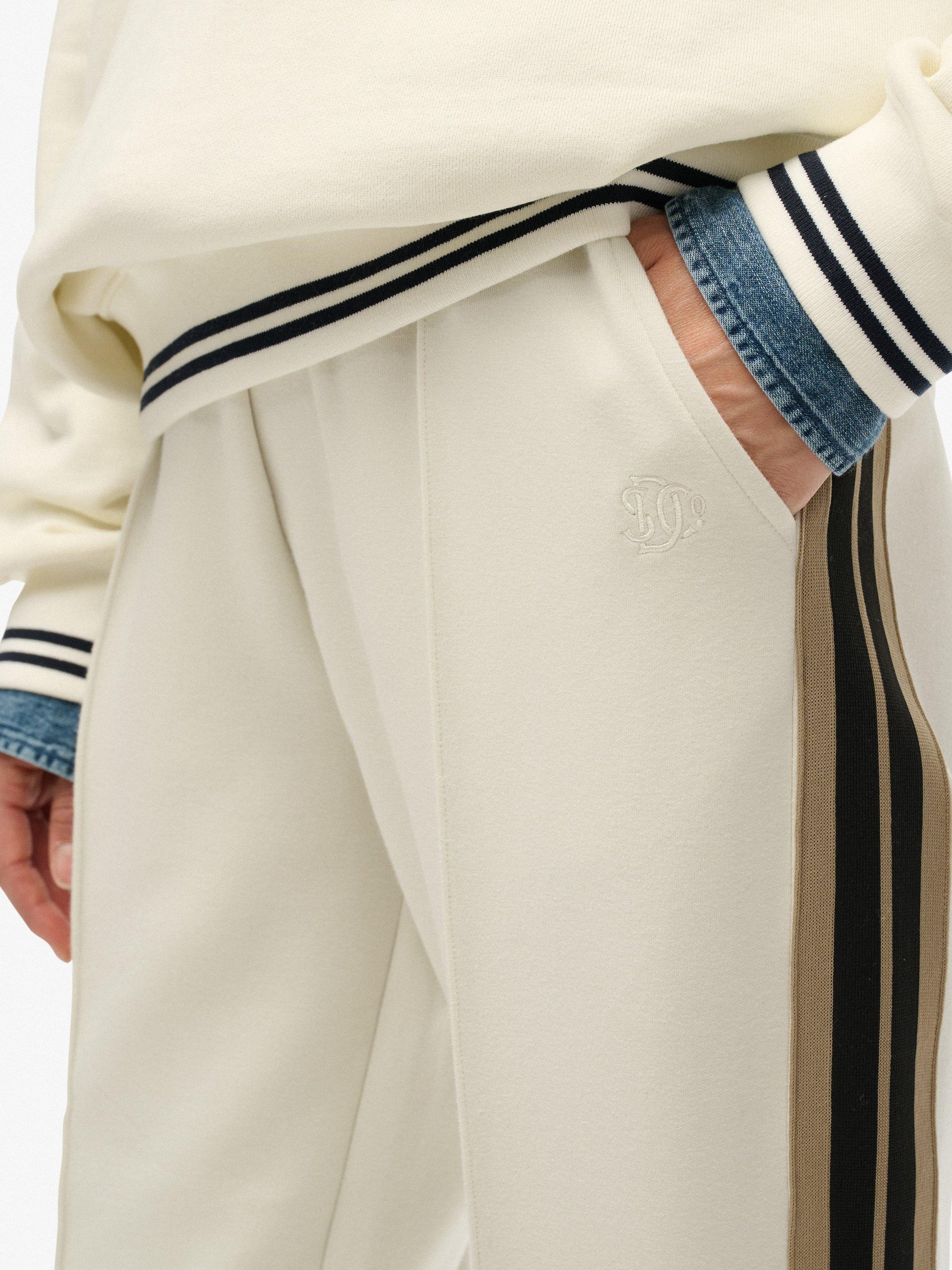 Product image 6 of 7, which shows Superdry Studios Stripe Straight Joggers, Off White, 14