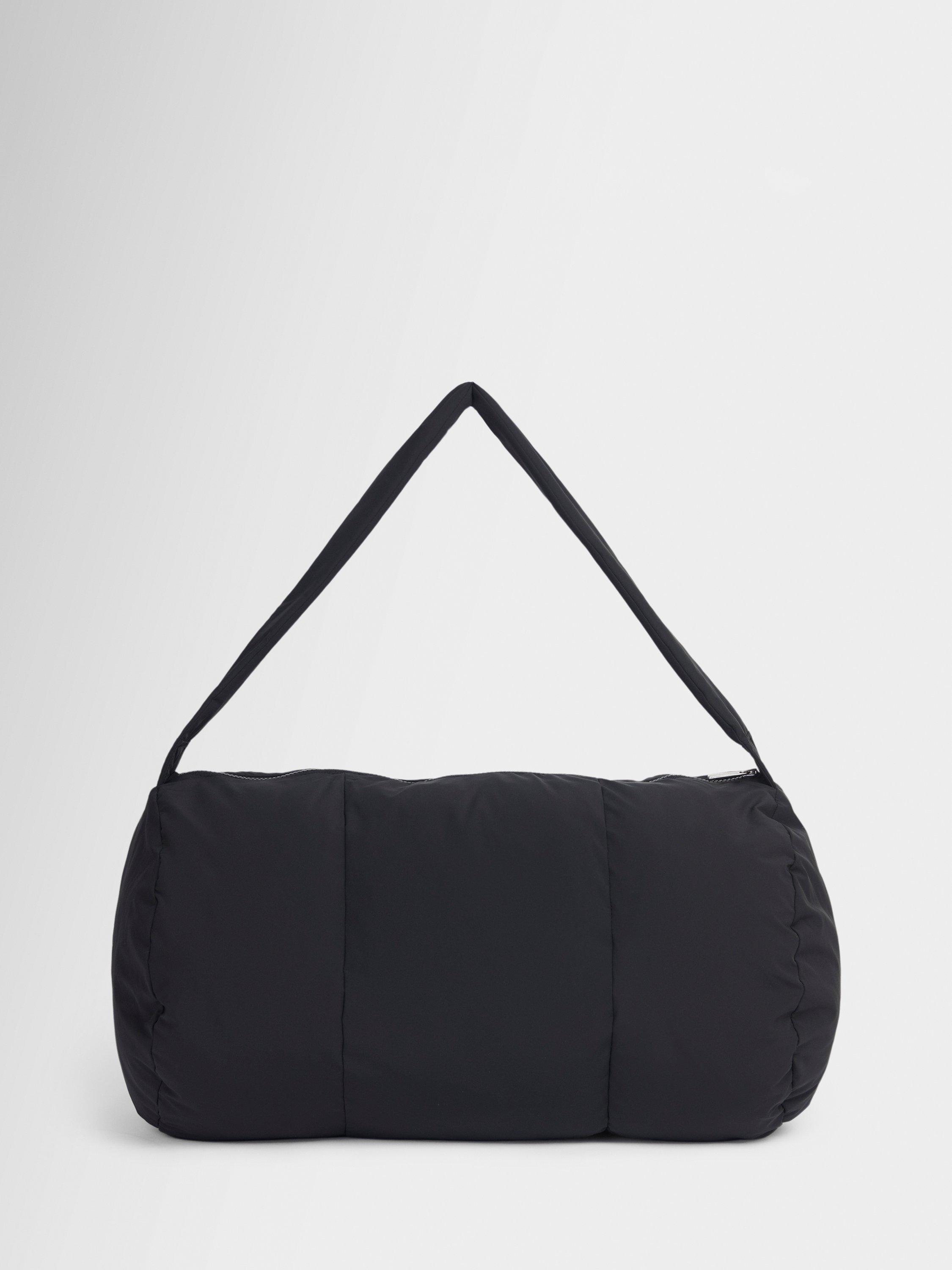 Product image 1 of 4, which shows Sweaty Betty Nimbus Cloud Duffel Bag, Black, One Size