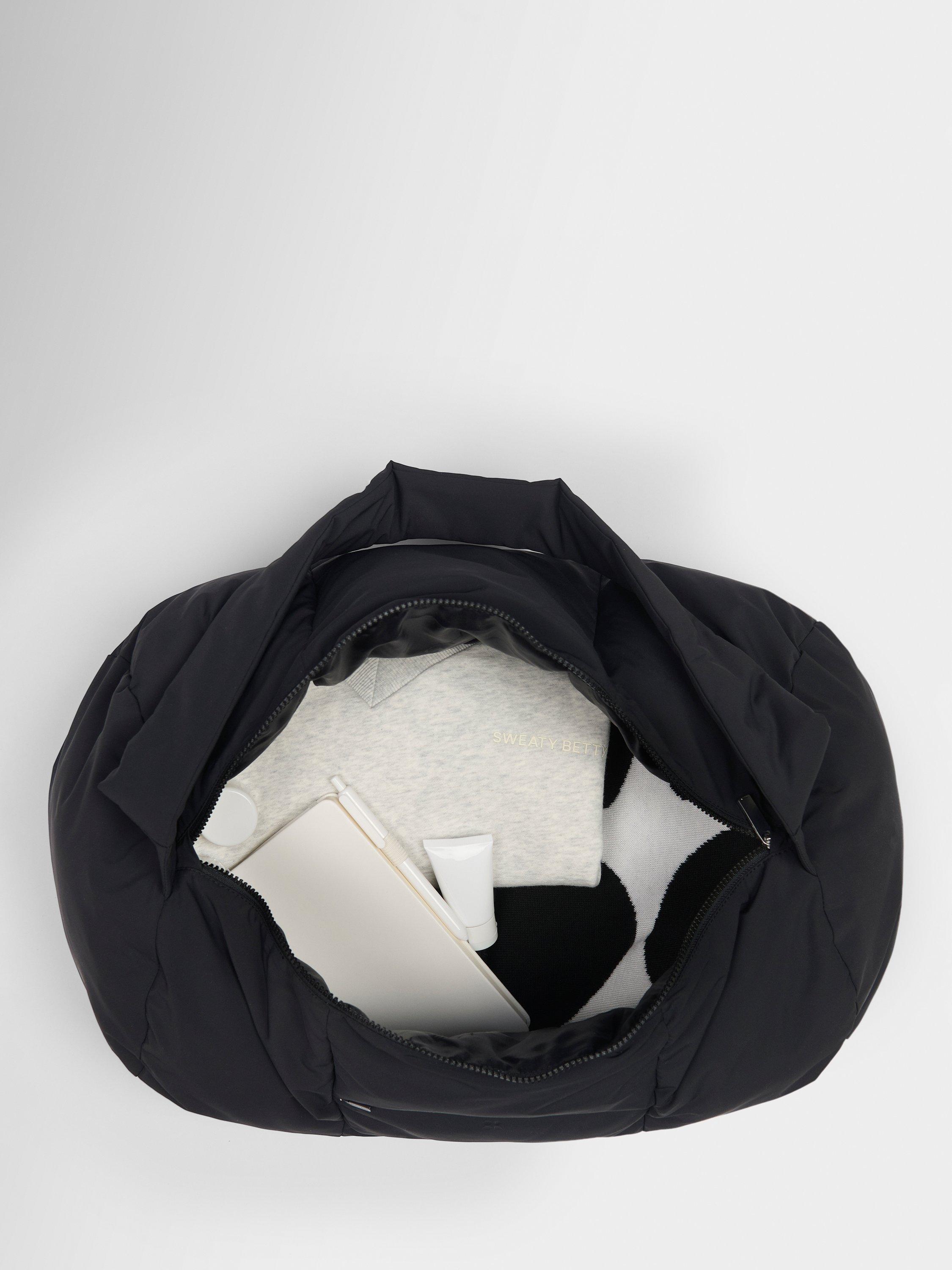 Product image 3 of 4, which shows Sweaty Betty Nimbus Cloud Duffel Bag, Black, One Size