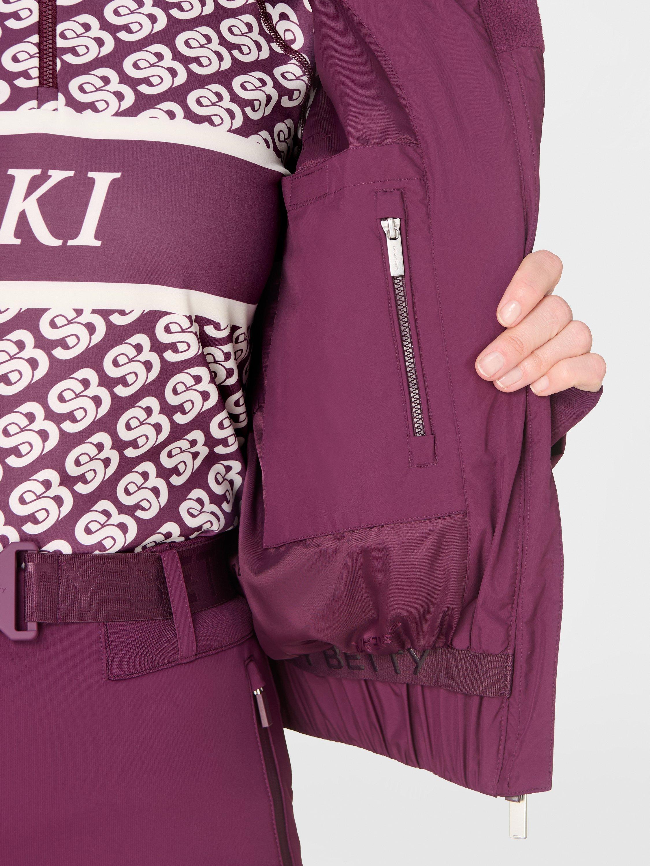 Product image 9 of 9, which shows Sweaty Betty Cropped Waterproof Ski Jacket, Plum Purple, XXS