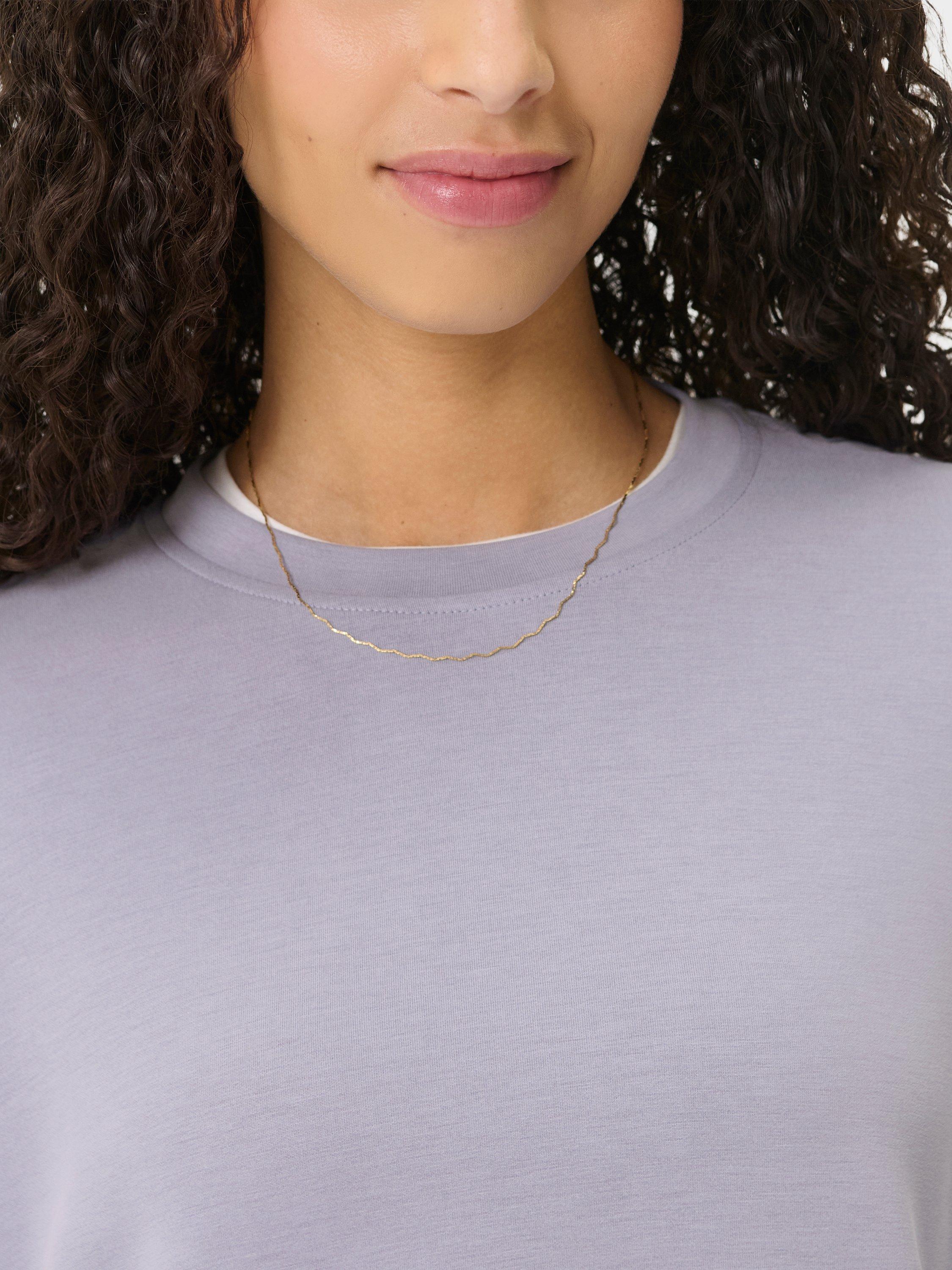 Product image 6 of 7, which shows Sweaty Betty Sand Wash CloudWeight Sweatshirt, Stellar Purple, XS