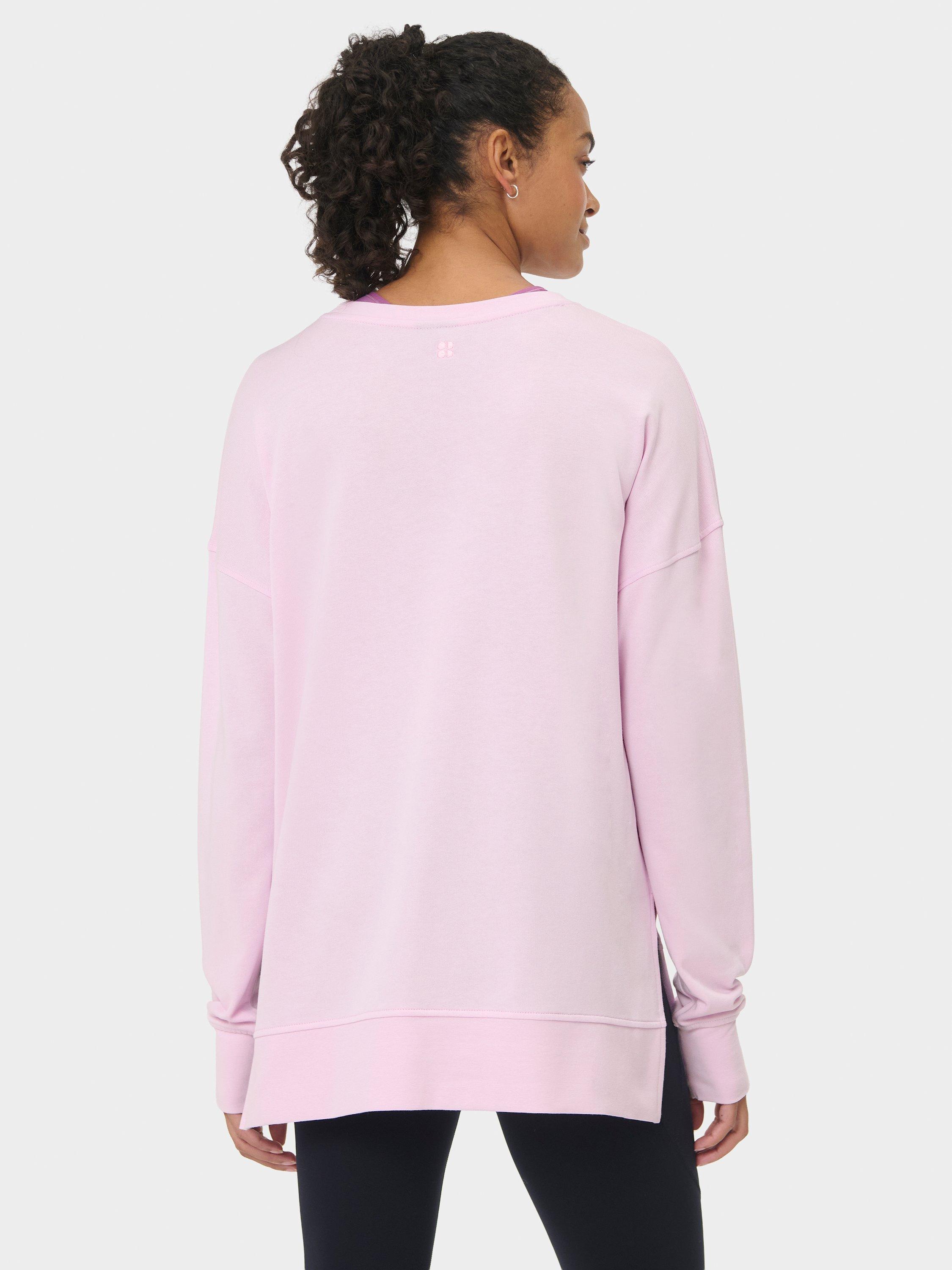 Product image 5 of 7, which shows Sweaty Betty After Class Longline Sweatshirt, Frost Pink, L