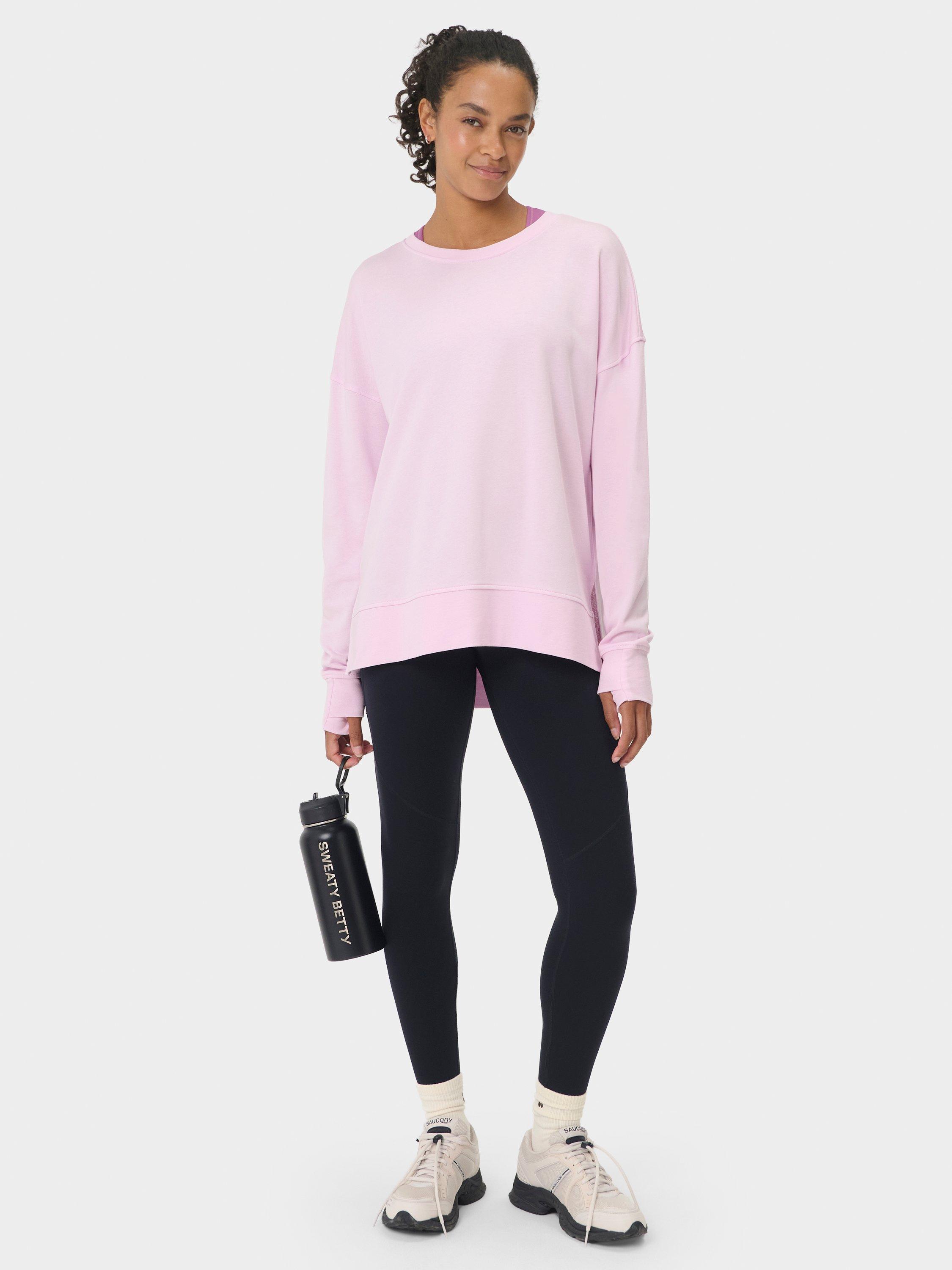 Product image 6 of 7, which shows Sweaty Betty After Class Longline Sweatshirt, Frost Pink, L