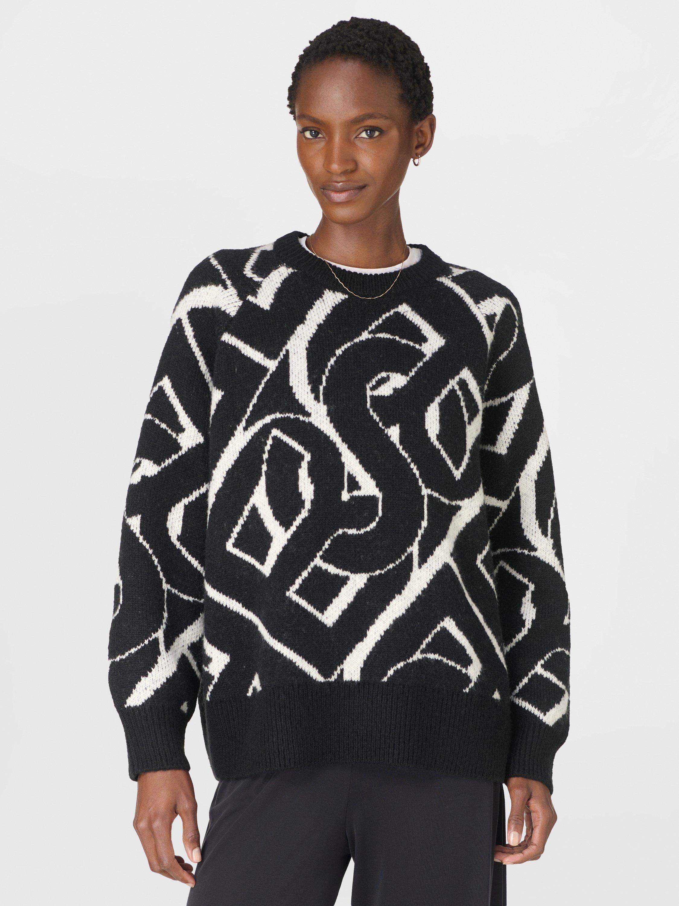 Product image 1 of 7, which shows Sweaty Betty Chain Jacquard Jumper, Black/White, XXS