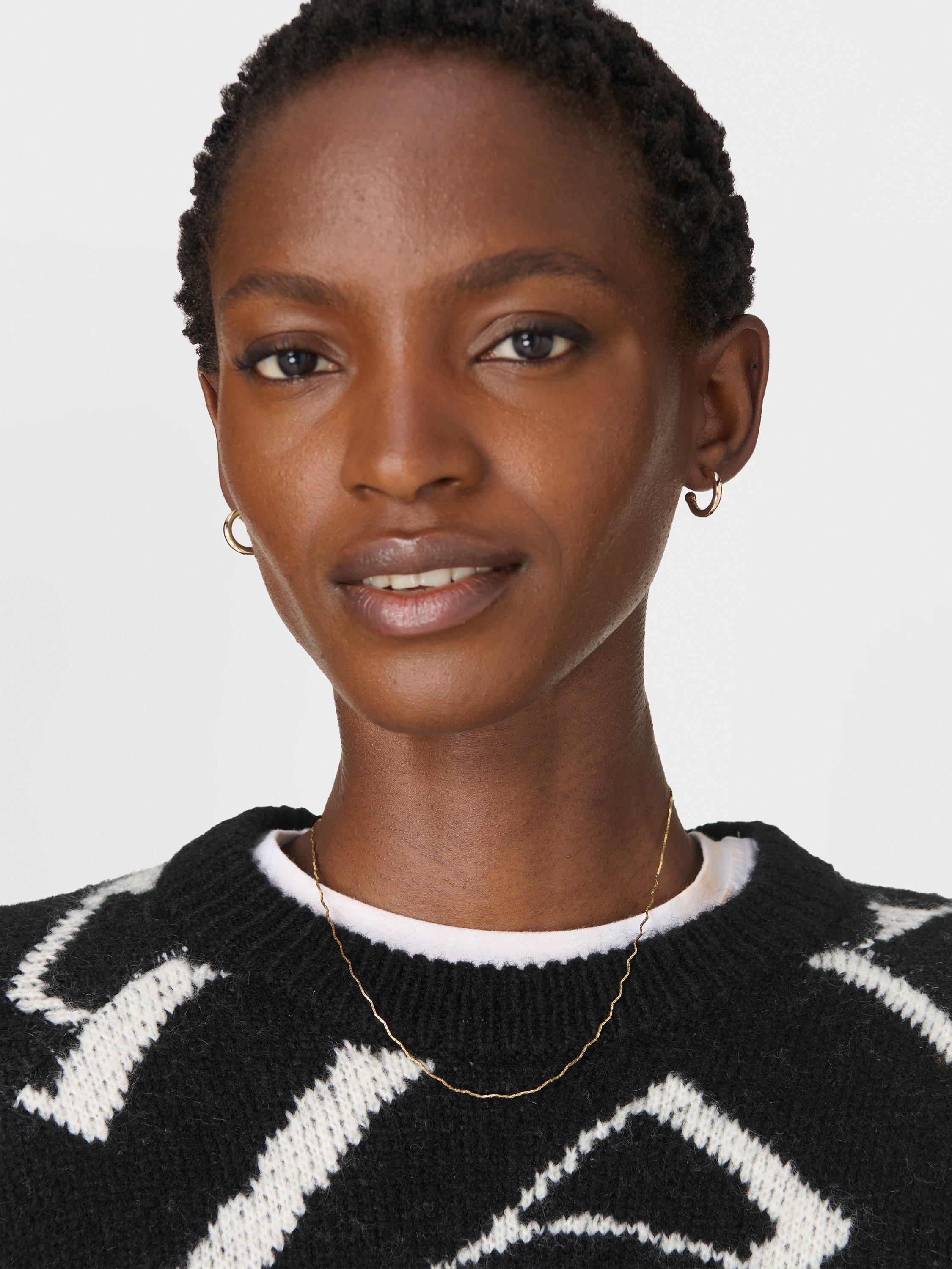 Product image 3 of 7, which shows Sweaty Betty Chain Jacquard Jumper, Black/White, XXS