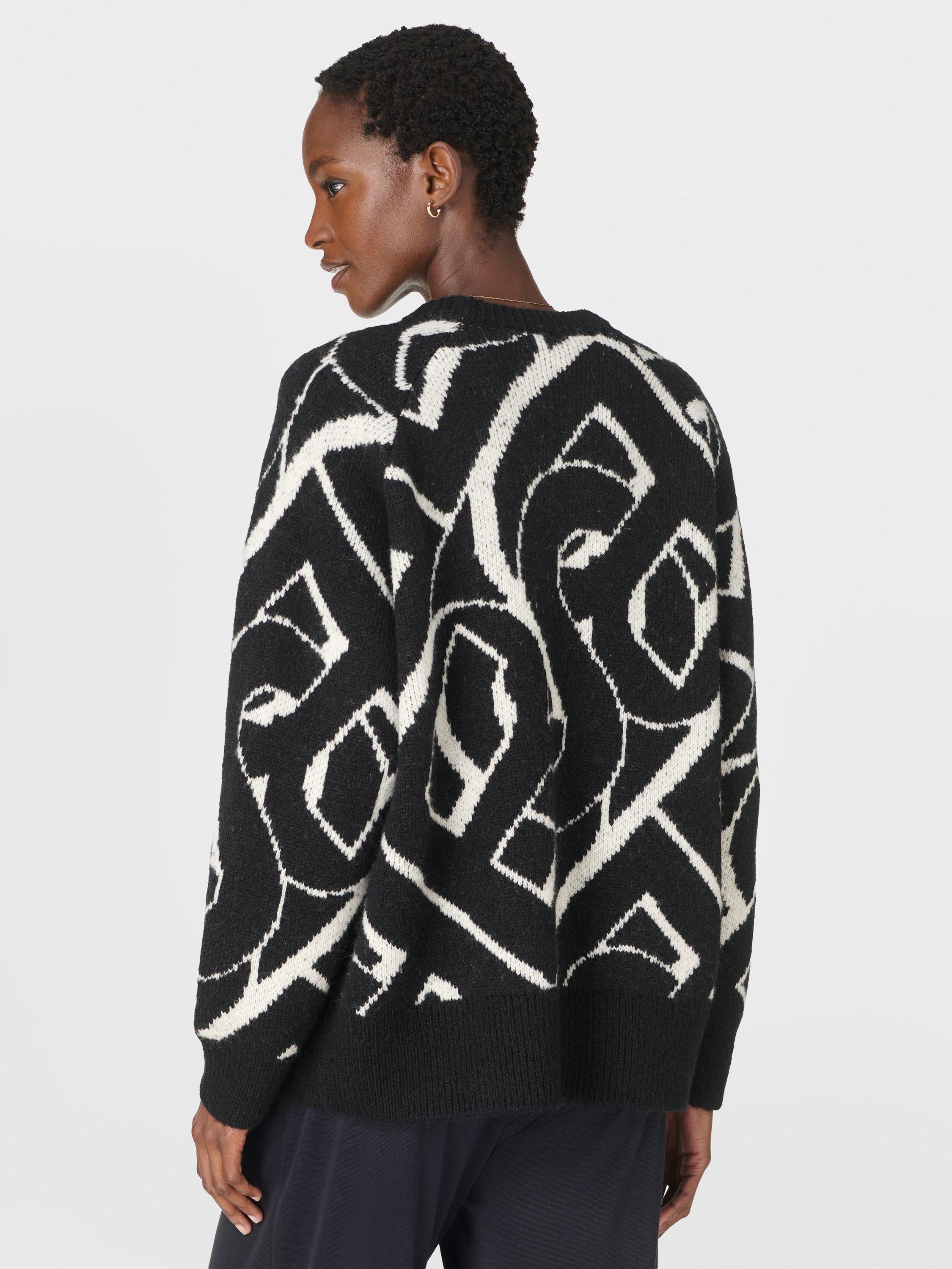 Product image 5 of 7, which shows Sweaty Betty Chain Jacquard Jumper, Black/White, XXS