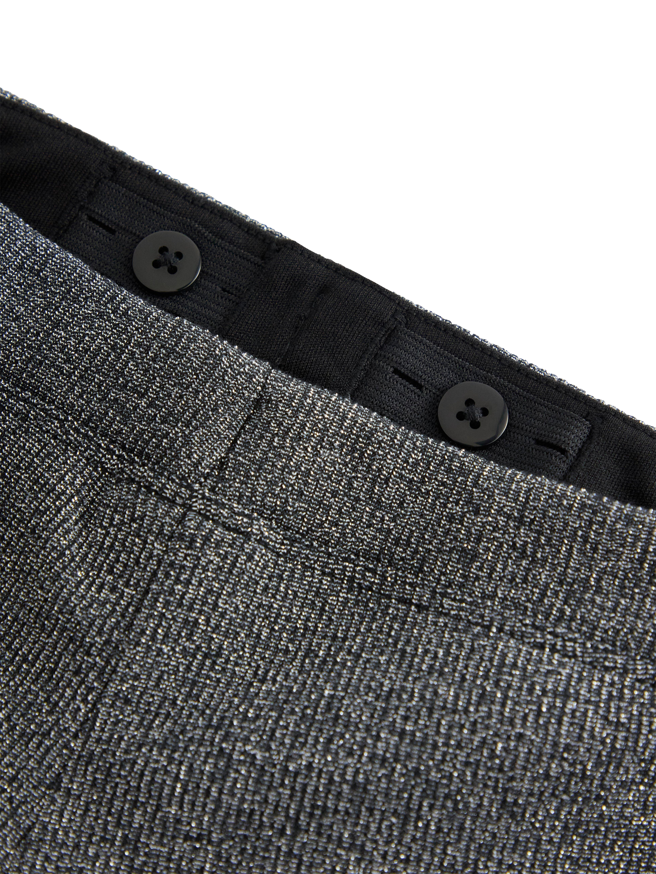 Product image 3 of 3, which shows Lindex Kids' Flared Stretch Trousers, Black, 8-9 years