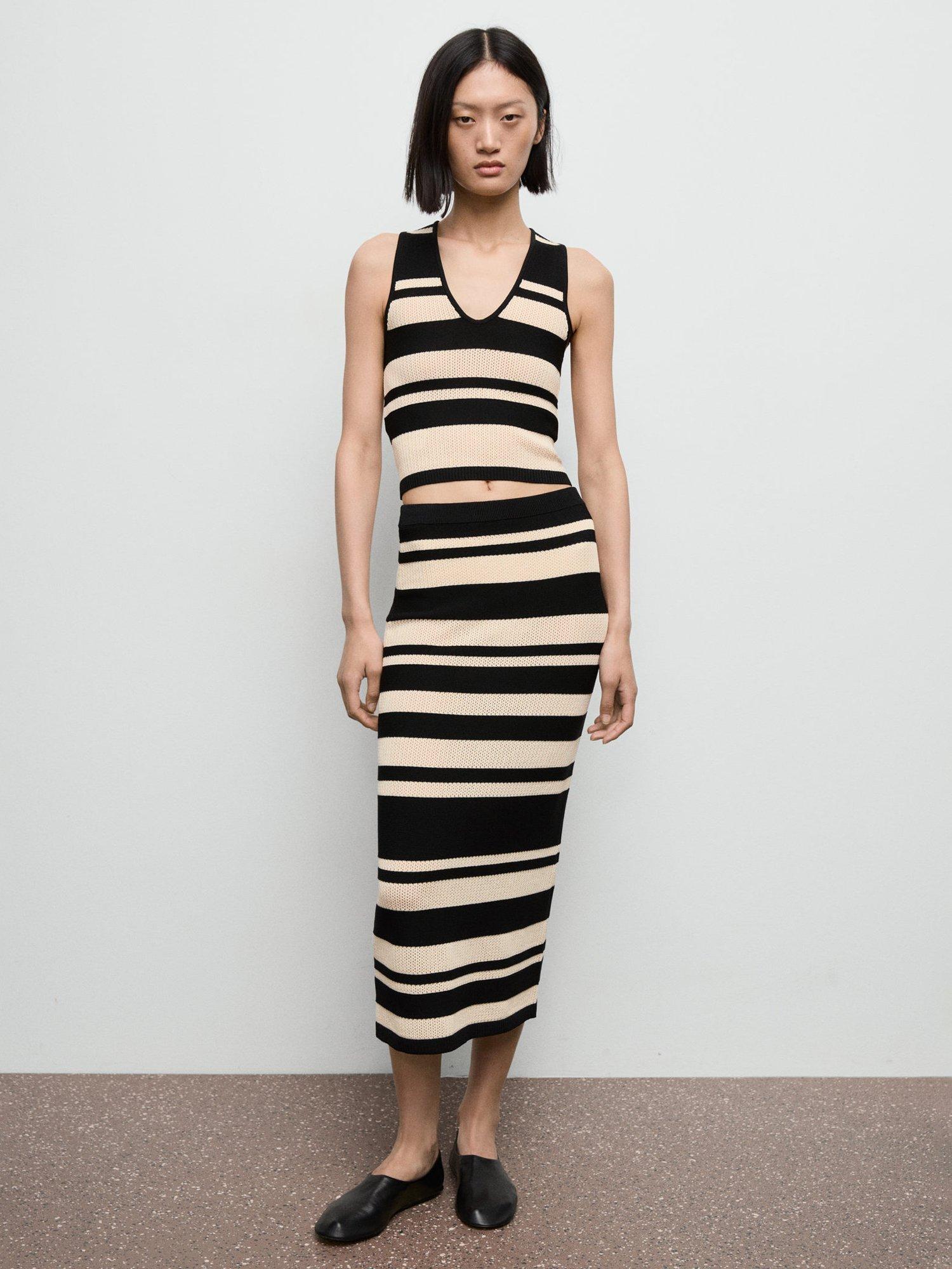 Product image 1 of 8, which shows Mango Noemi Stripe Knit Midi Skirt, Black, L