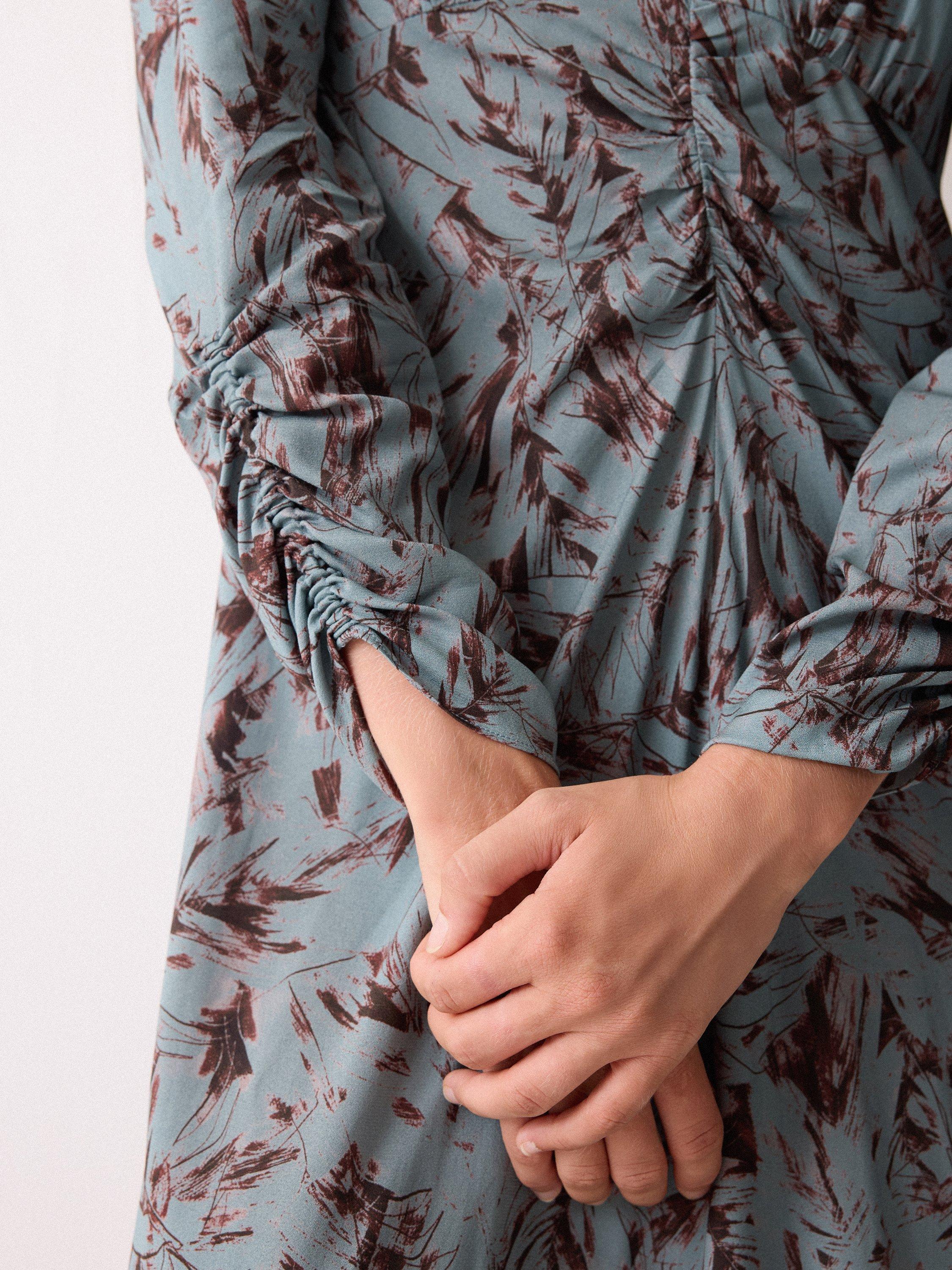 Product image 6 of 6, which shows Jigsaw Long Sleeved Feather Print Midi Dress, Blue/Multi, 6