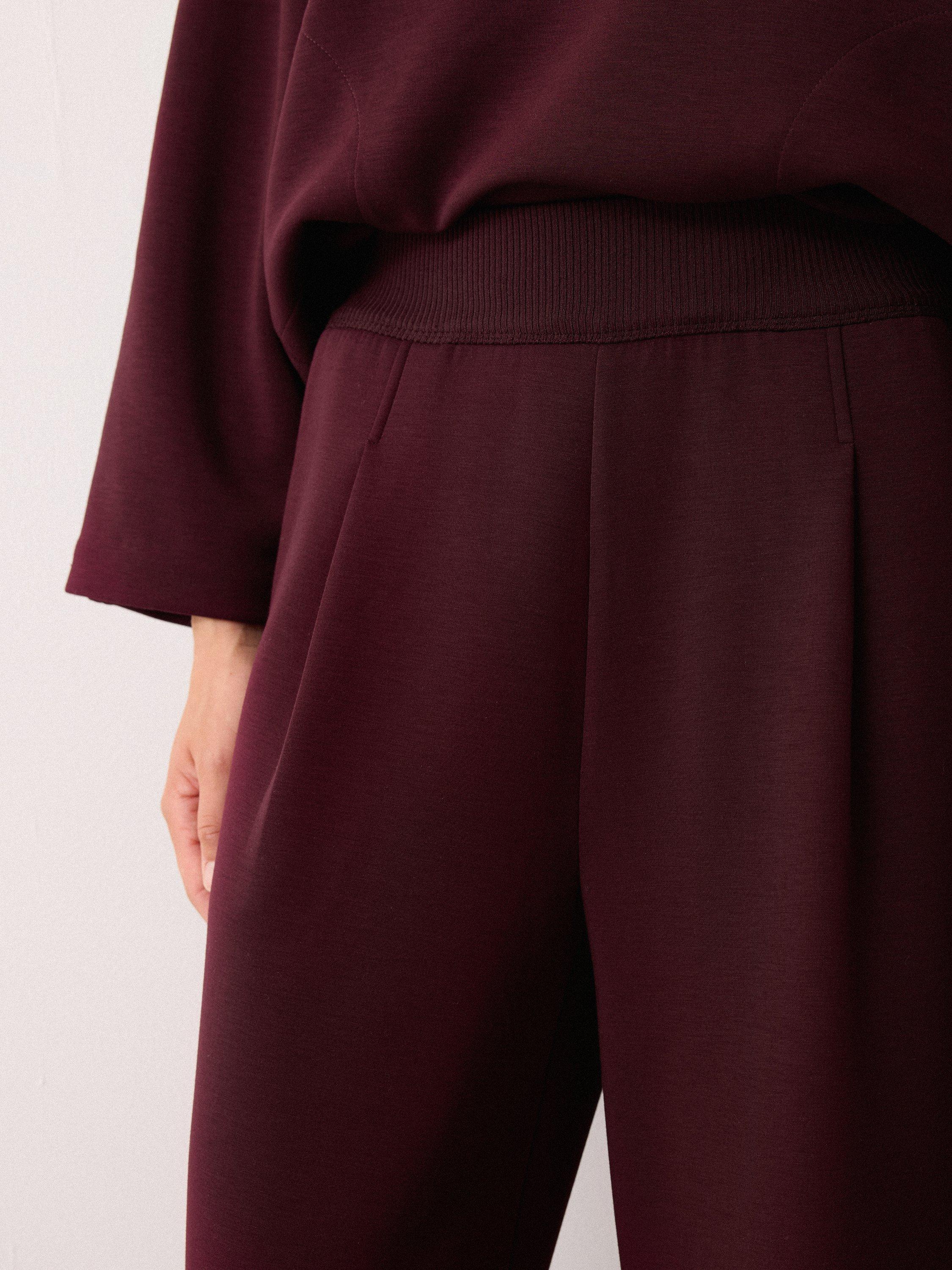 Product image 4 of 7, which shows Jigsaw Luxe Pleat Wide Leg Joggers, Burgandy, XS