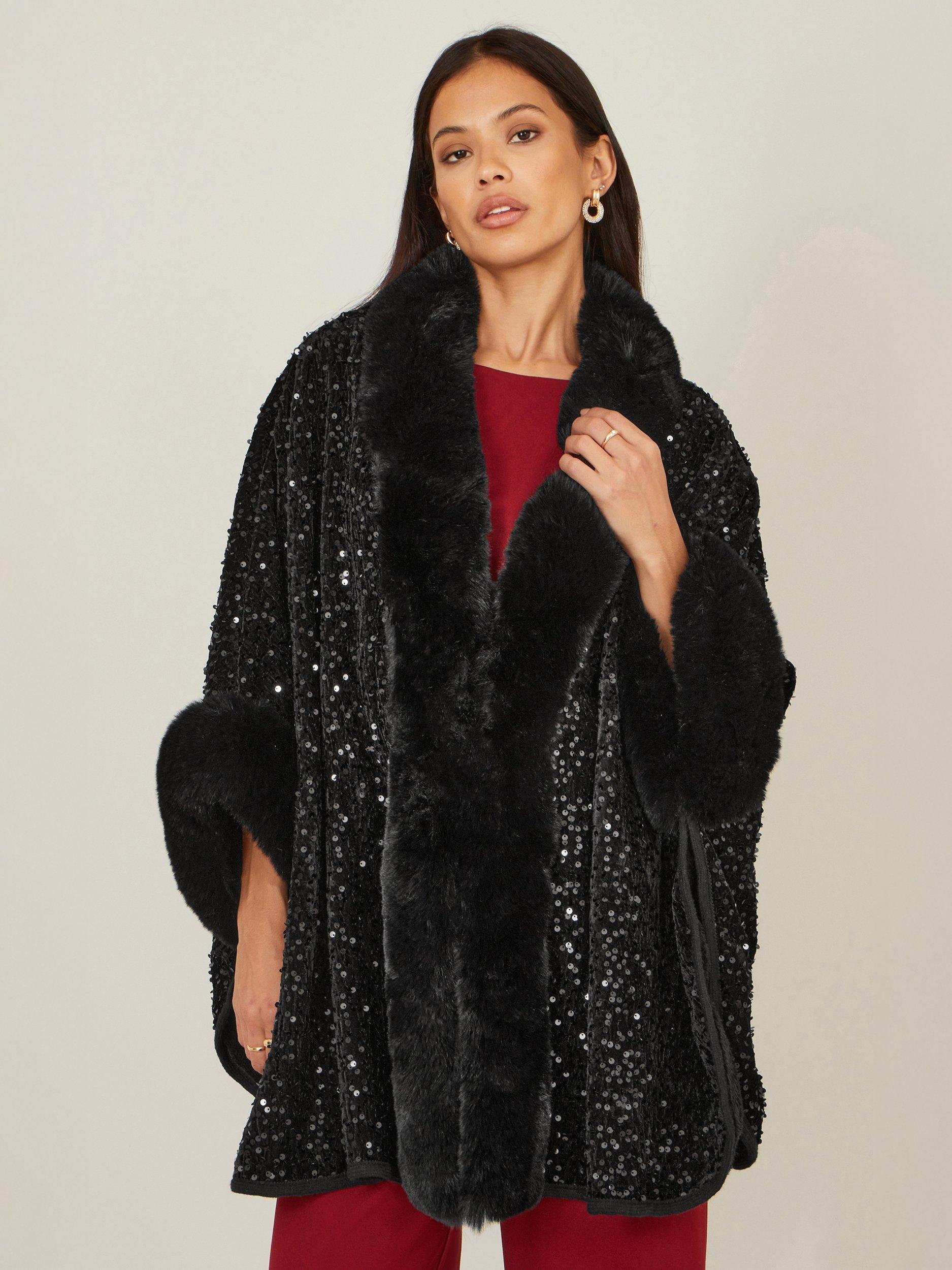 Product image 1 of 4, which shows Yumi Faux Fur Sequin Cape, Black, S-M