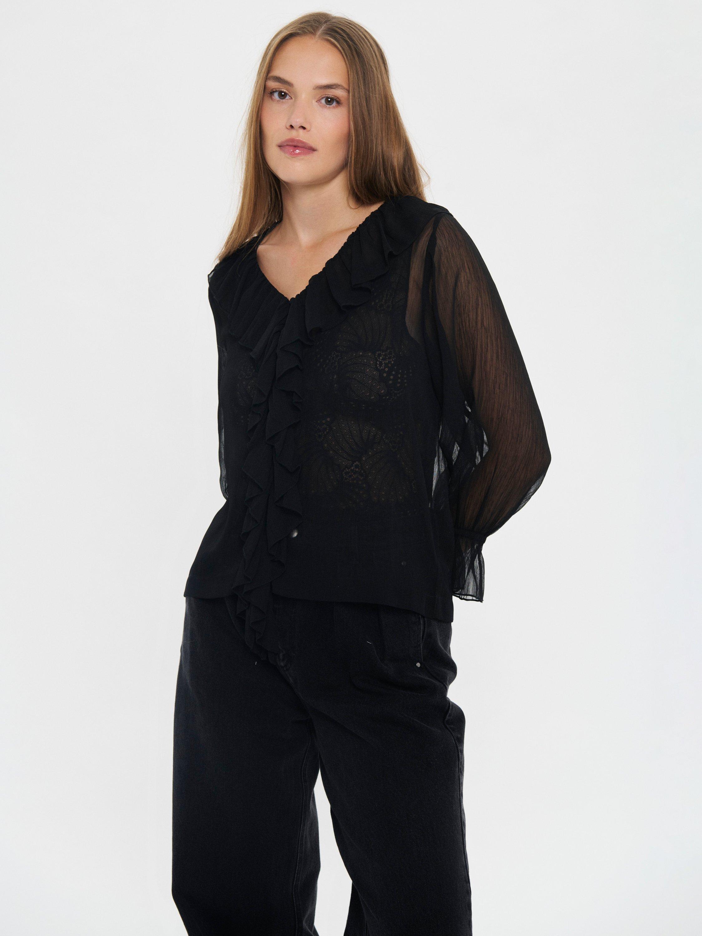 Product image 1 of 6, which shows Saint Tropez Nanette Sheer Ruffle Top, Black, XS