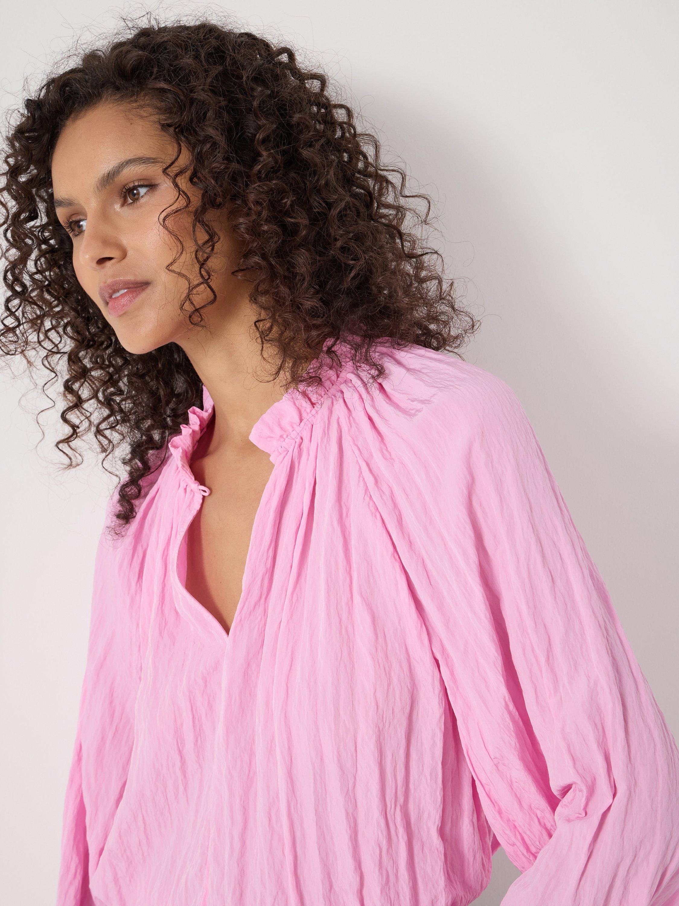 Product image 5 of 5, which shows HUSH Ruffle Long Sleeve Top, Candy Pink, XXS