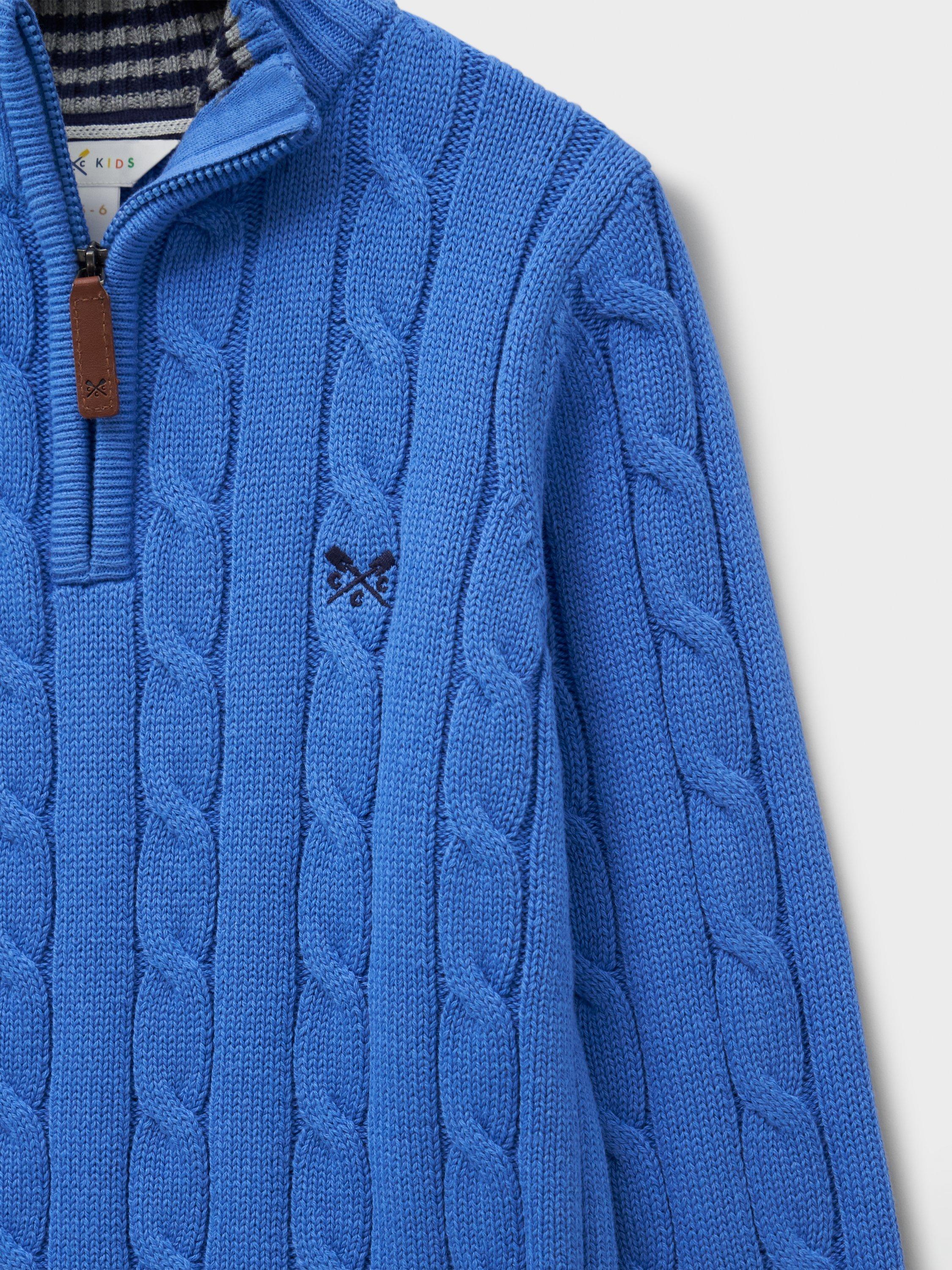 Product image 3 of 3, which shows Crew Clothing Kids' Cotton Cable Zip-Neck Jumper, Mid Blue, 8-9 years