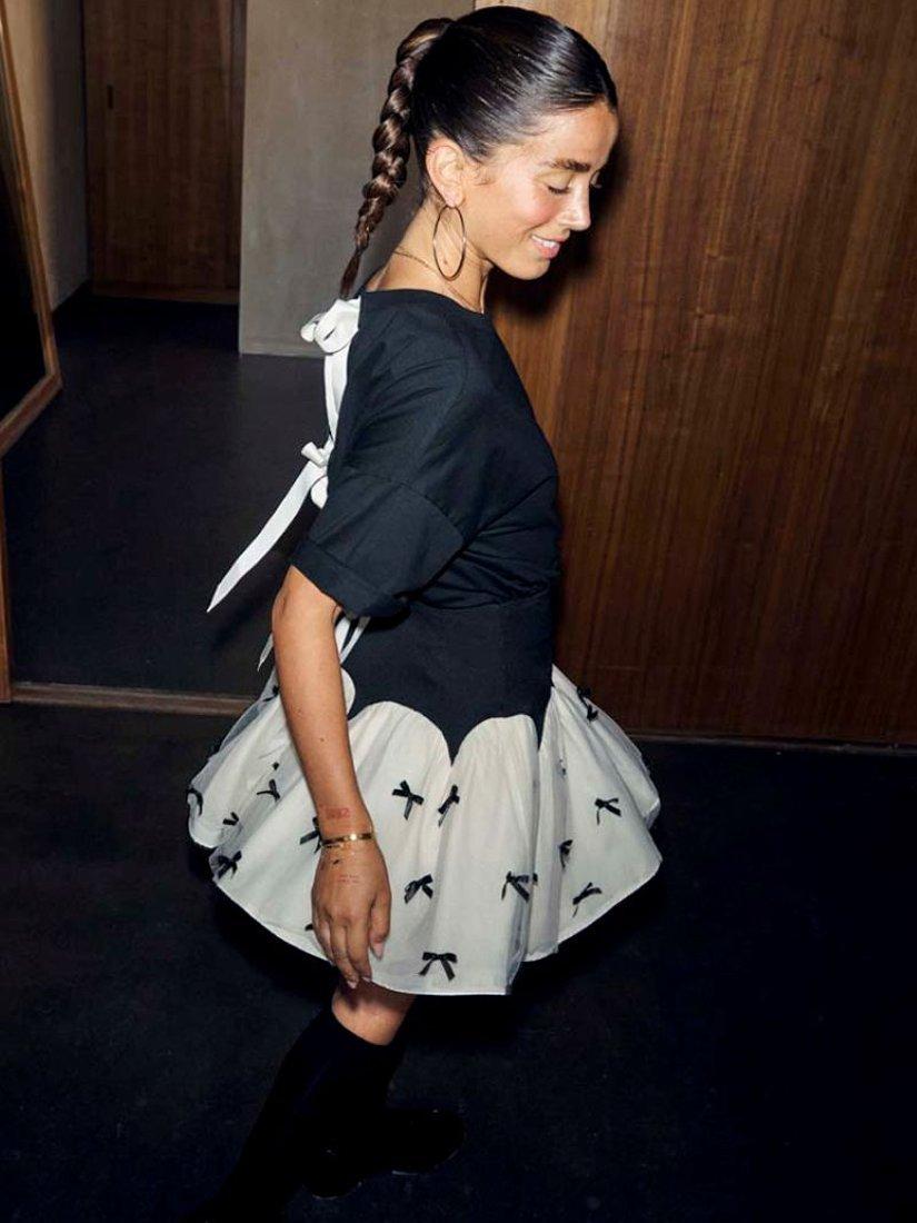 Product image 4 of 6, which shows Never Fully Dressed Monika Bow Mini Skirt, Black, 6