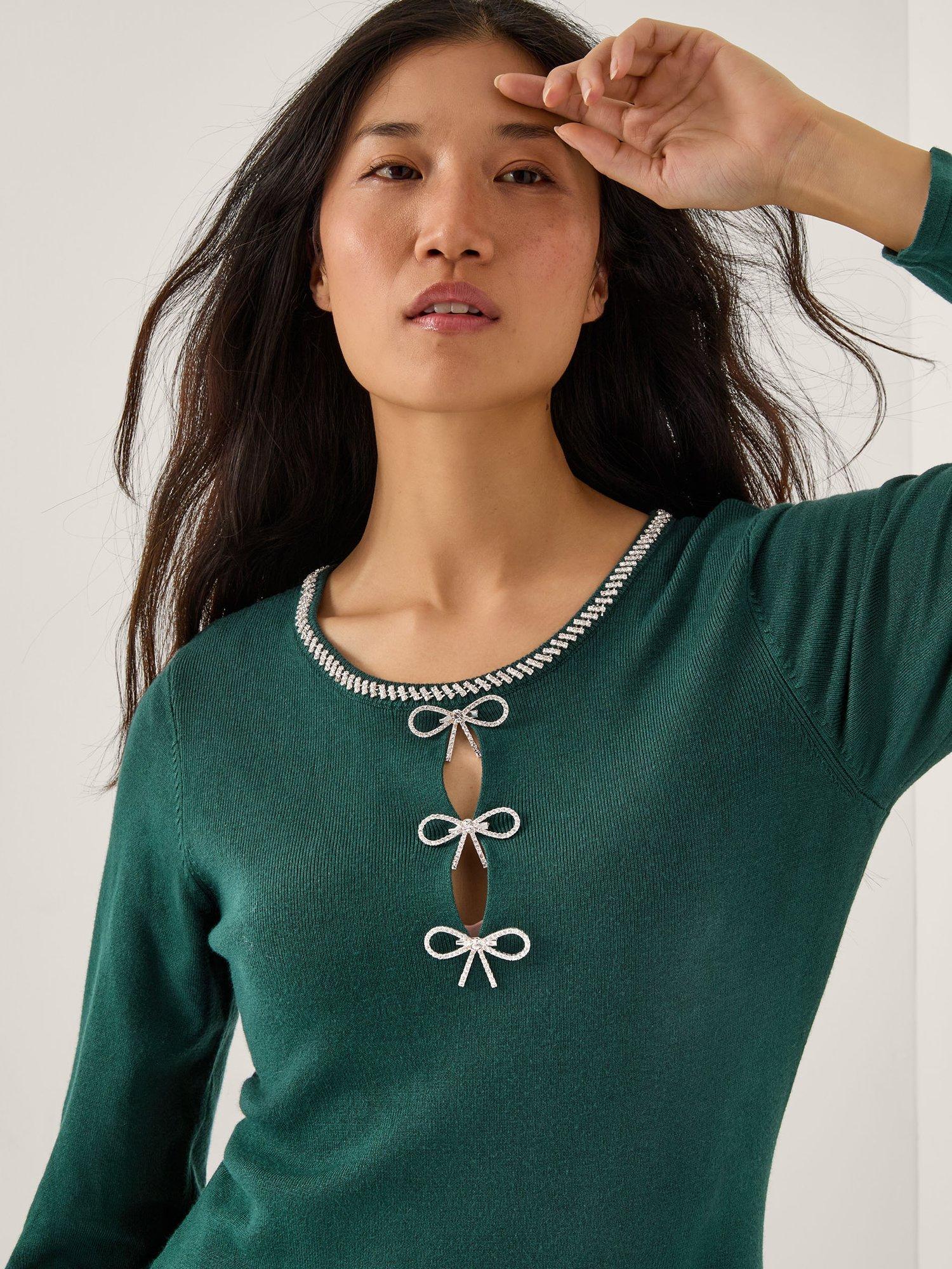 Product image 4 of 5, which shows Monsoon Brit Sparkle Bow Knit Mini Dress , Teal, S