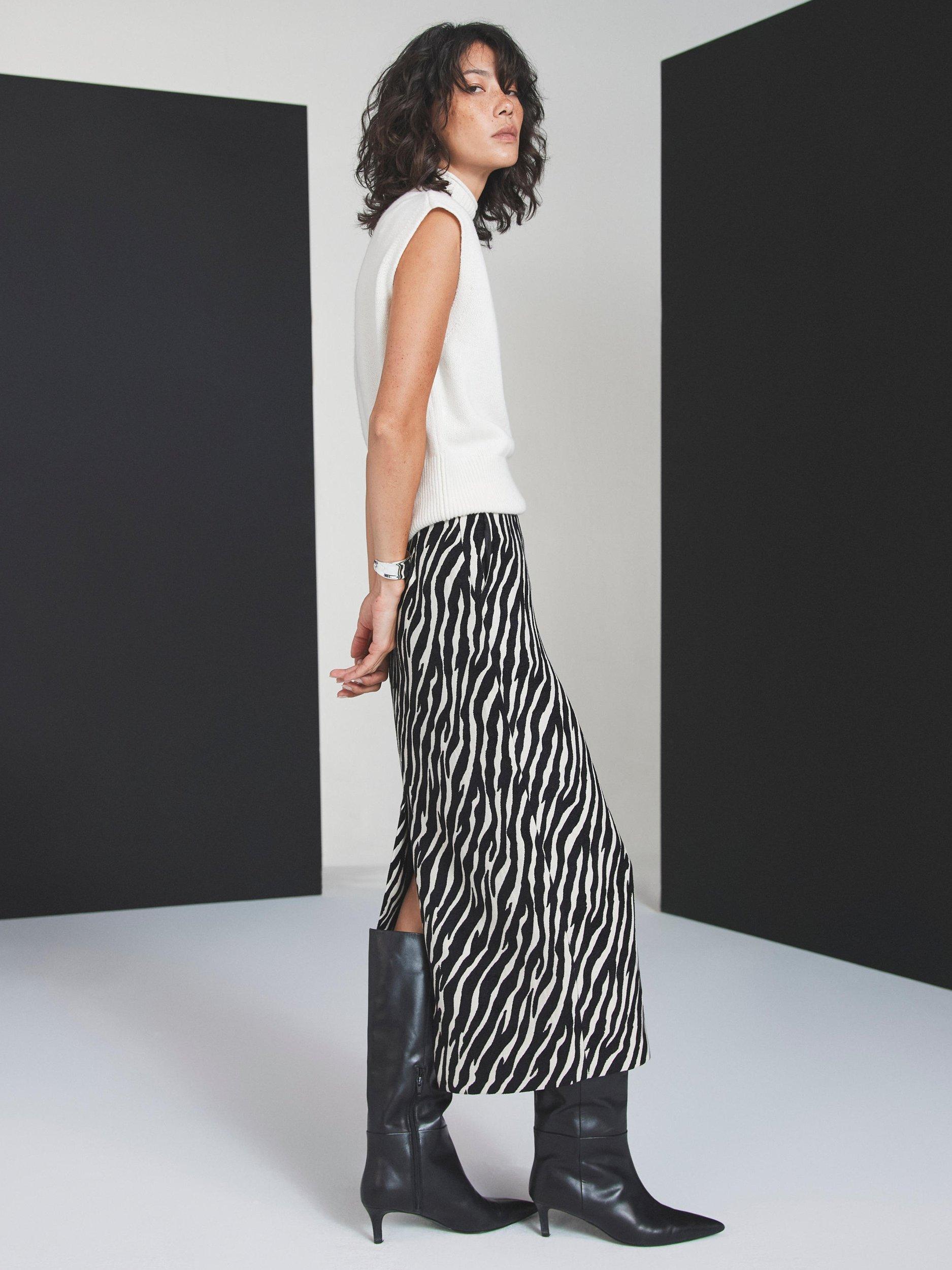 Product image 1 of 8, which shows Mint Velvet Zebra Print Midi Skirt, White/Black, 16