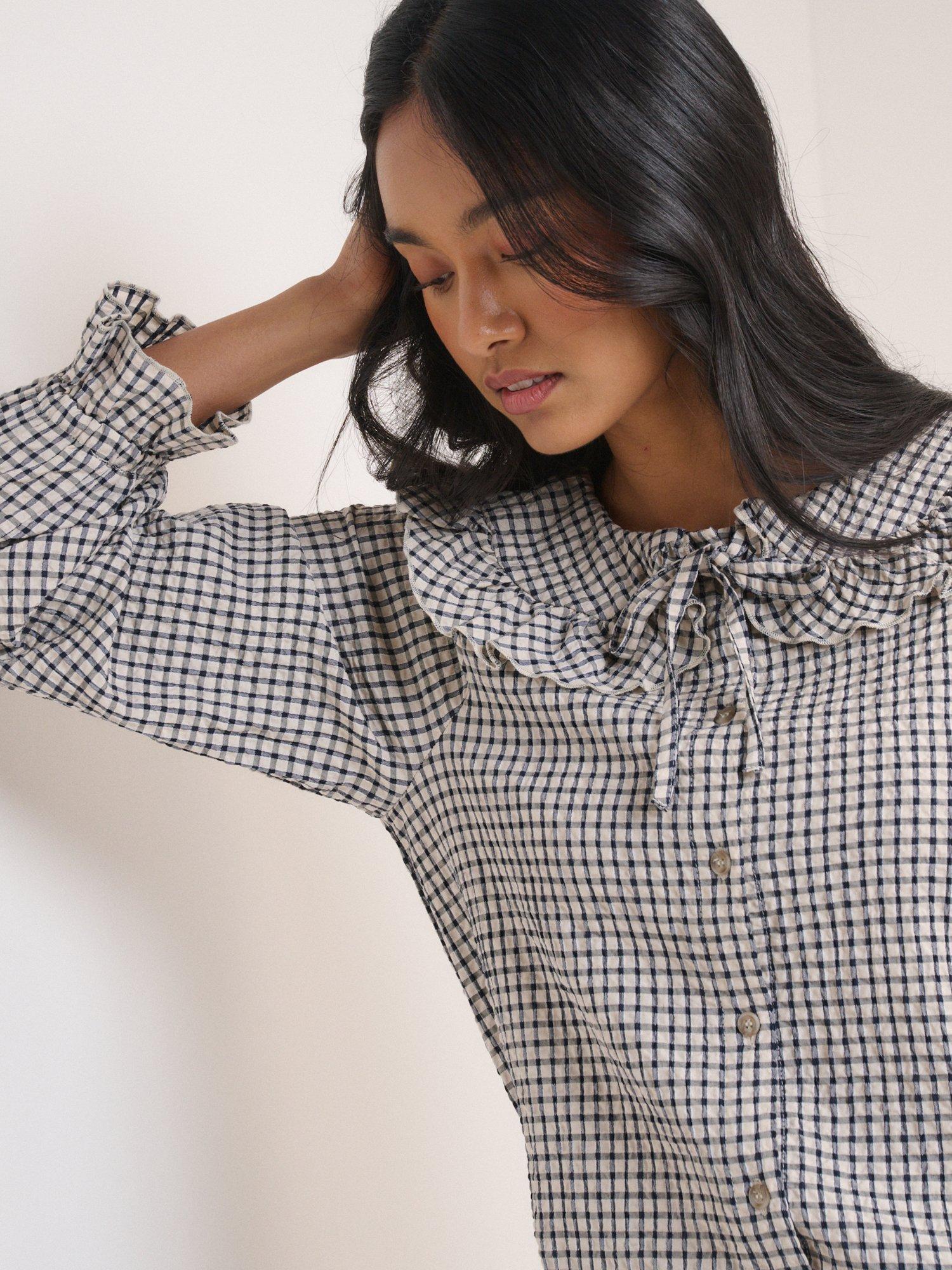 Nobody's Child Lawrence Ruffle Collar Check Blouse containing