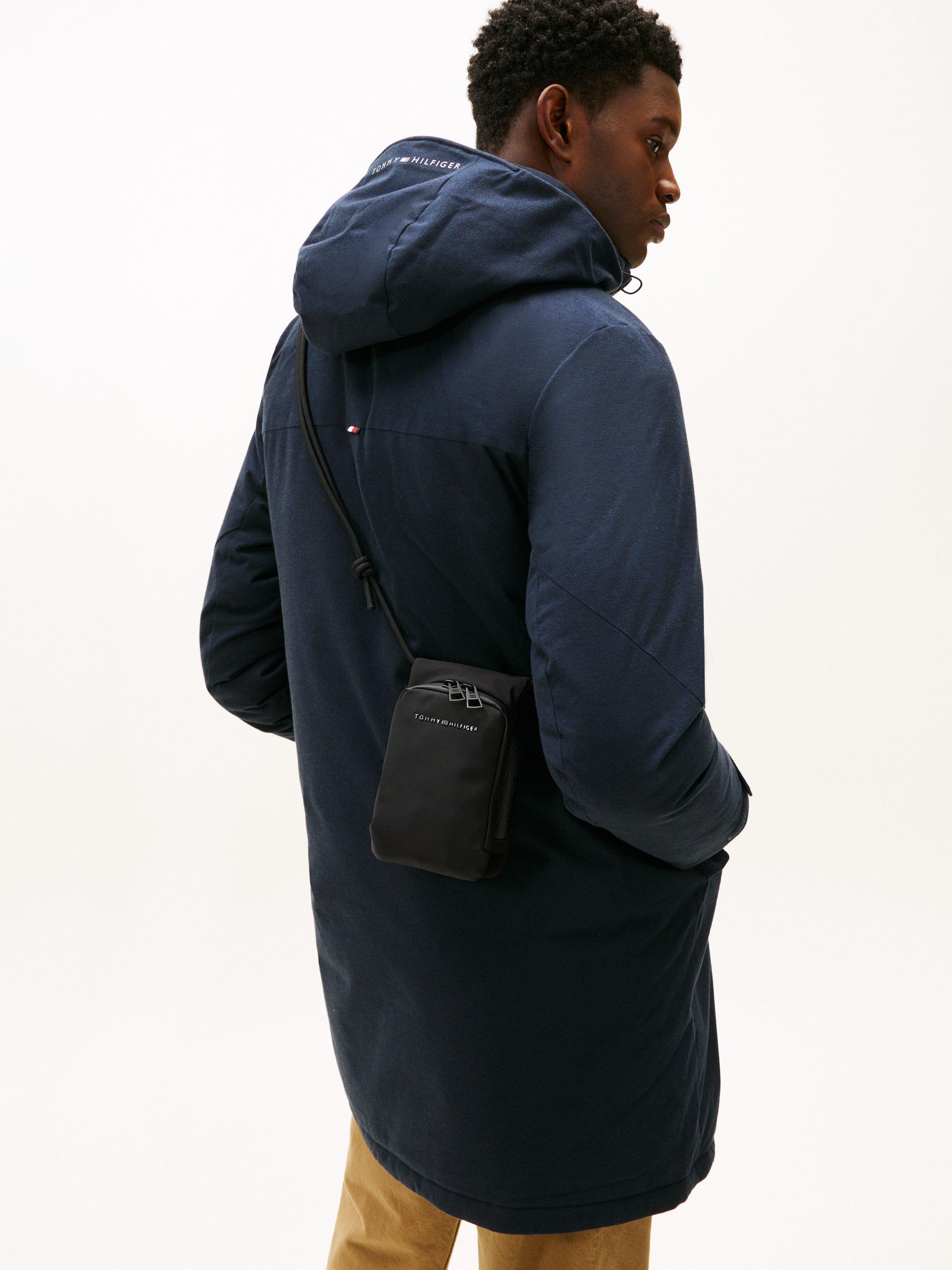 Product image 2 of 5, which shows Tommy Hilfiger Textile Flap Logo Travel Pouch, Black, One Size