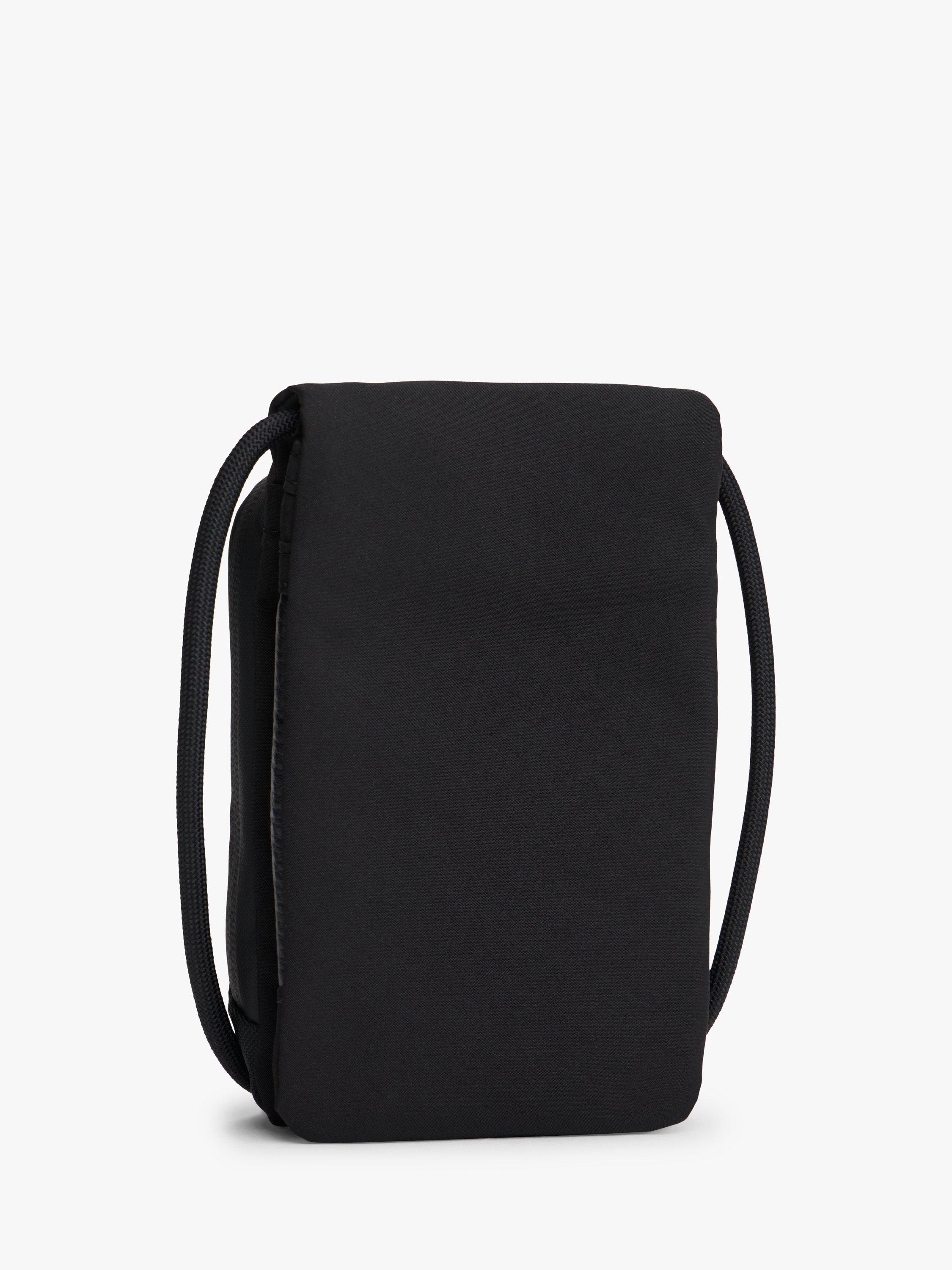 Product image 3 of 5, which shows Tommy Hilfiger Textile Flap Logo Travel Pouch, Black, One Size