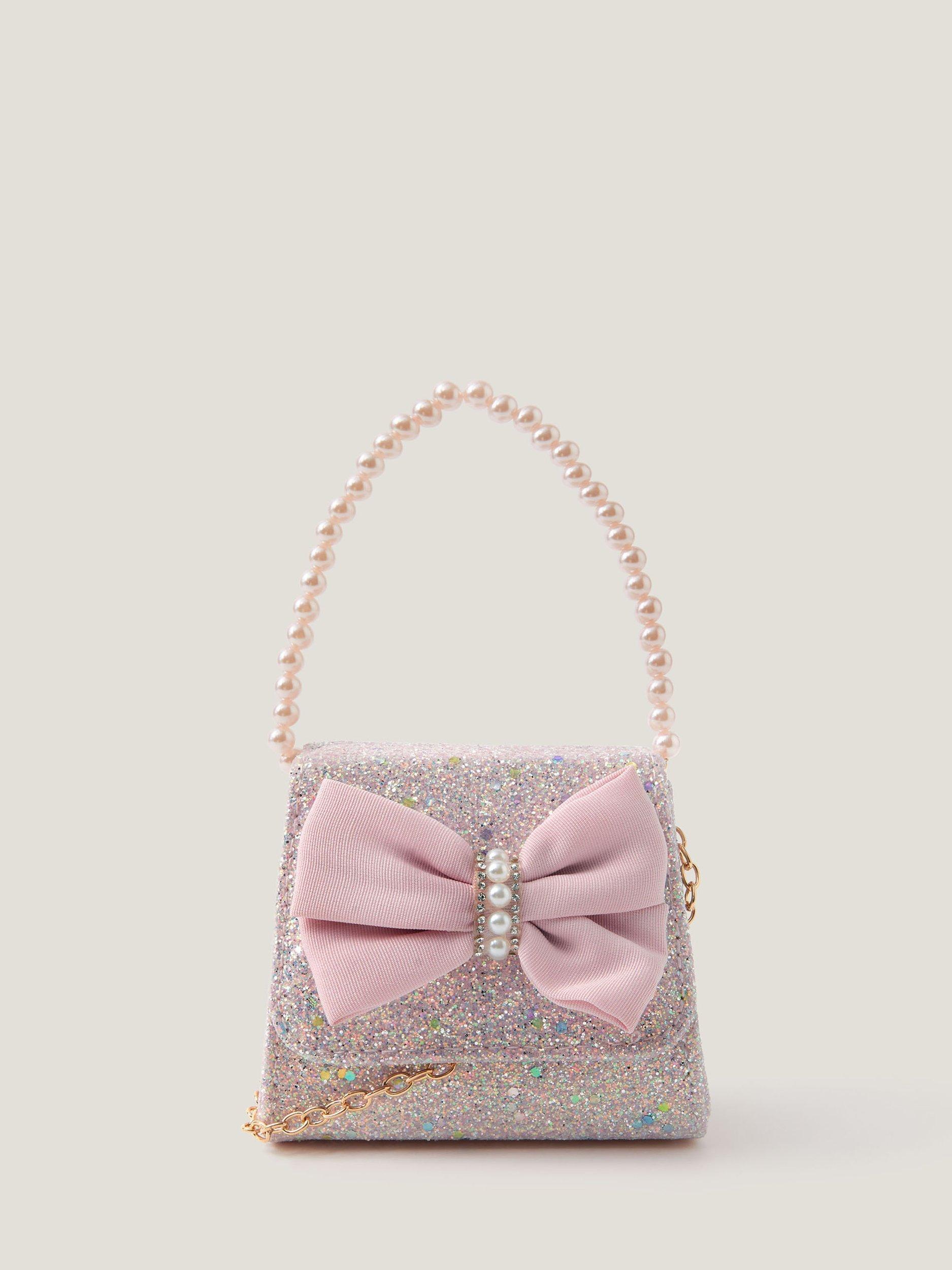 Product image 1 of 4, which shows Monsoon Kids' Bow Glitter Bag, Pink