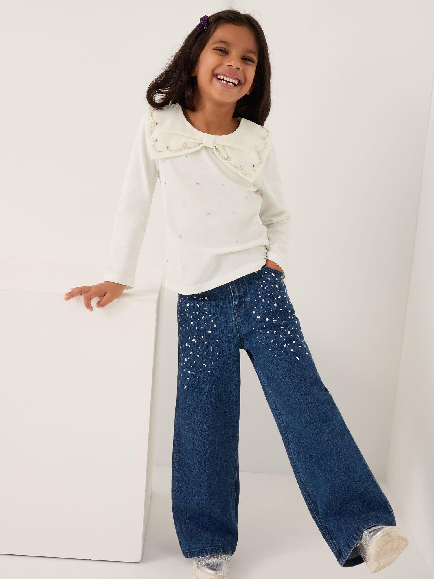 Product image 1 of 4, which shows Monsoon Kids' Cotton Bow Rhinestone Top, Ivory, 3-4 years