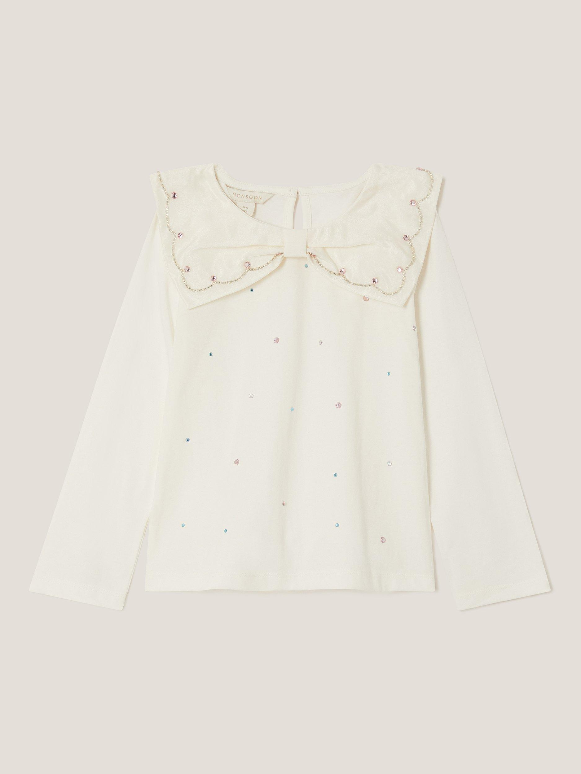 Product image 2 of 4, which shows Monsoon Kids' Cotton Bow Rhinestone Top, Ivory, 3-4 years
