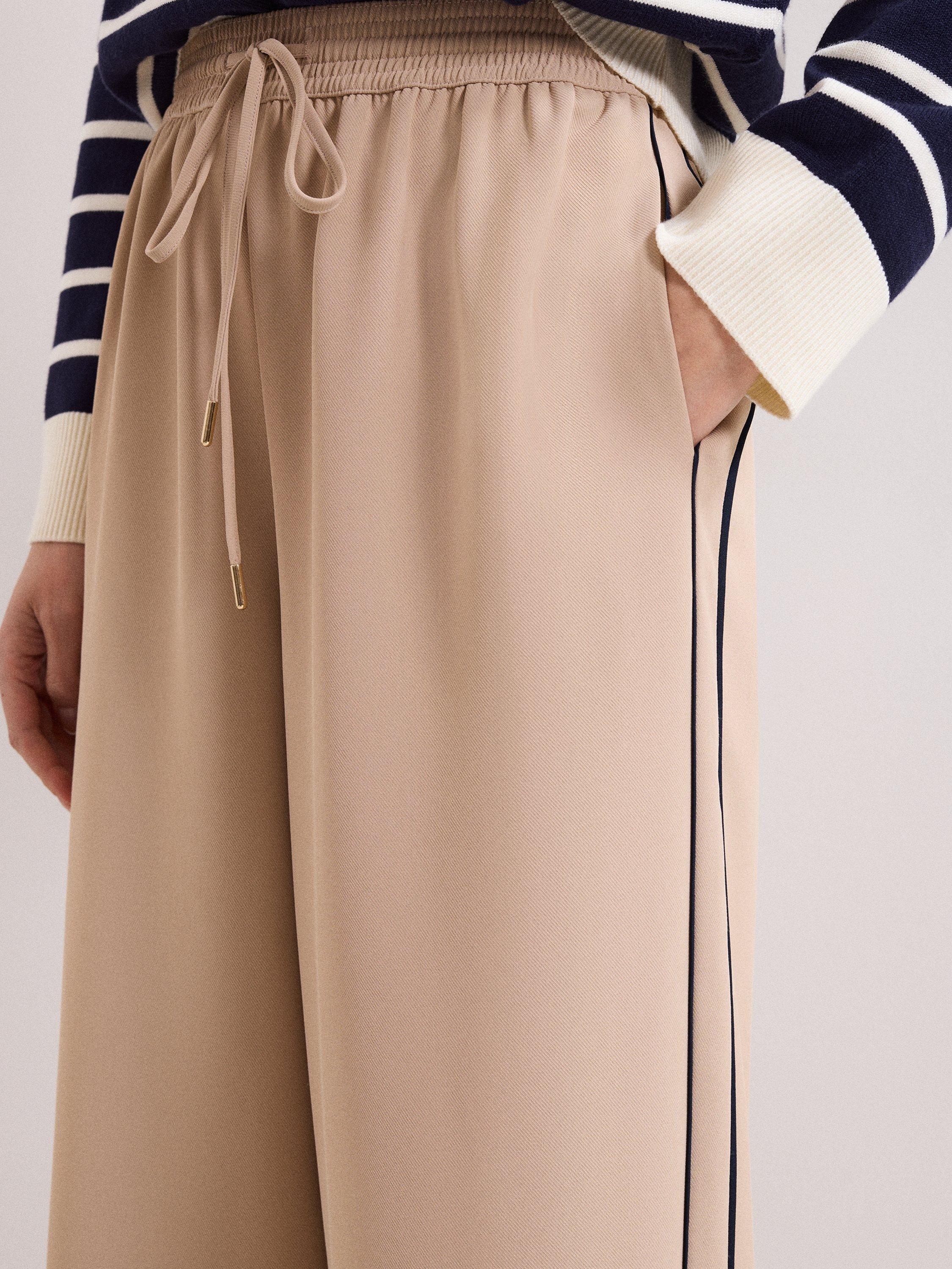 Product image 4 of 7, which shows Phase Eight Petite Skye Side Stripe Trousers, Camel, 10