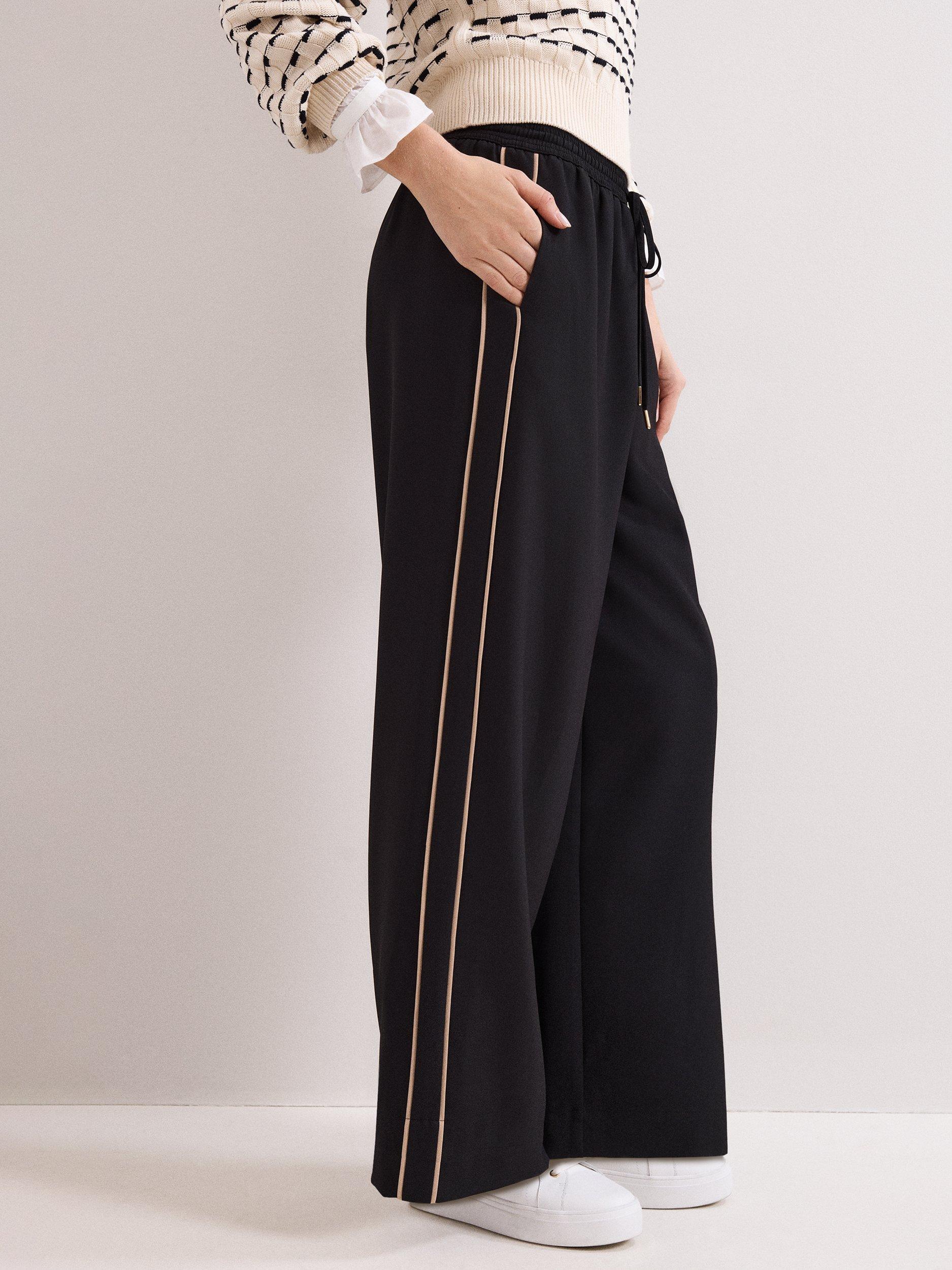 Product image 1 of 9, which shows Phase Eight Skye Side Stripe Trousers, Black, 10
