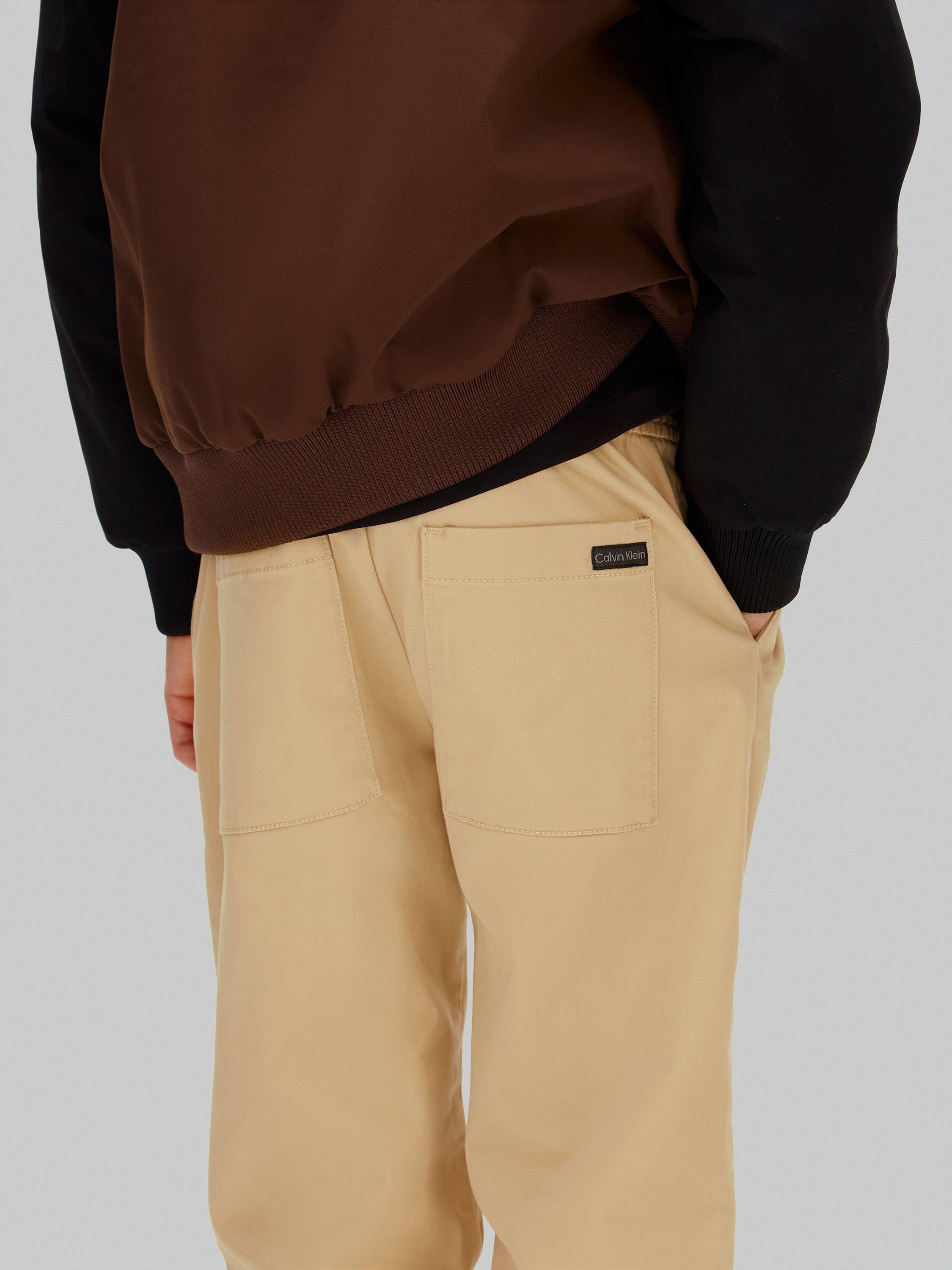 Product image 4 of 6, which shows Calvin Klein Kids' Straight Trousers, Sandy Beige, 8 years