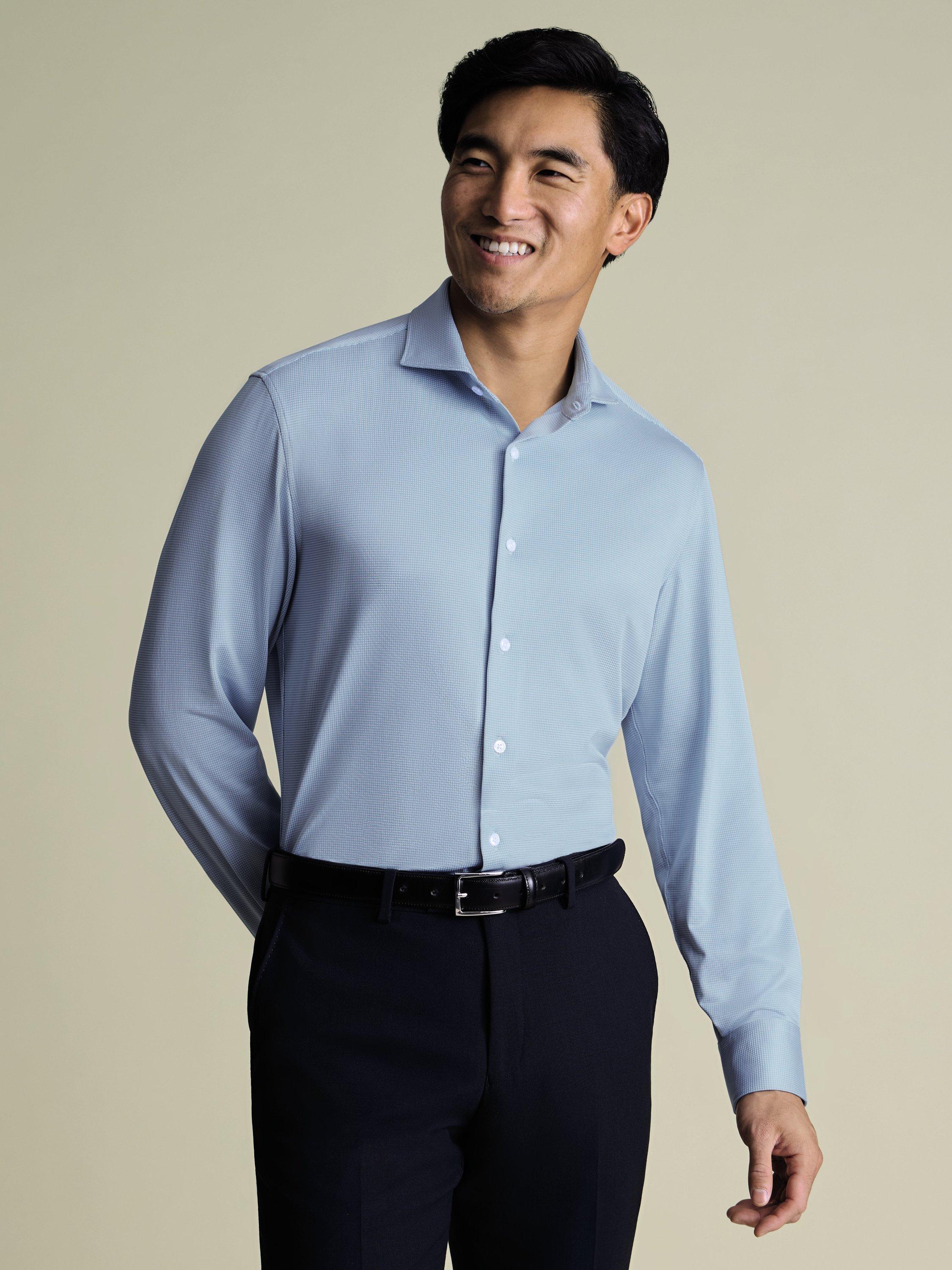 Product image 1 of 6, which shows Charles Tyrwhitt Regular Fit Performance Jersey Shirt, Light Blue, XS