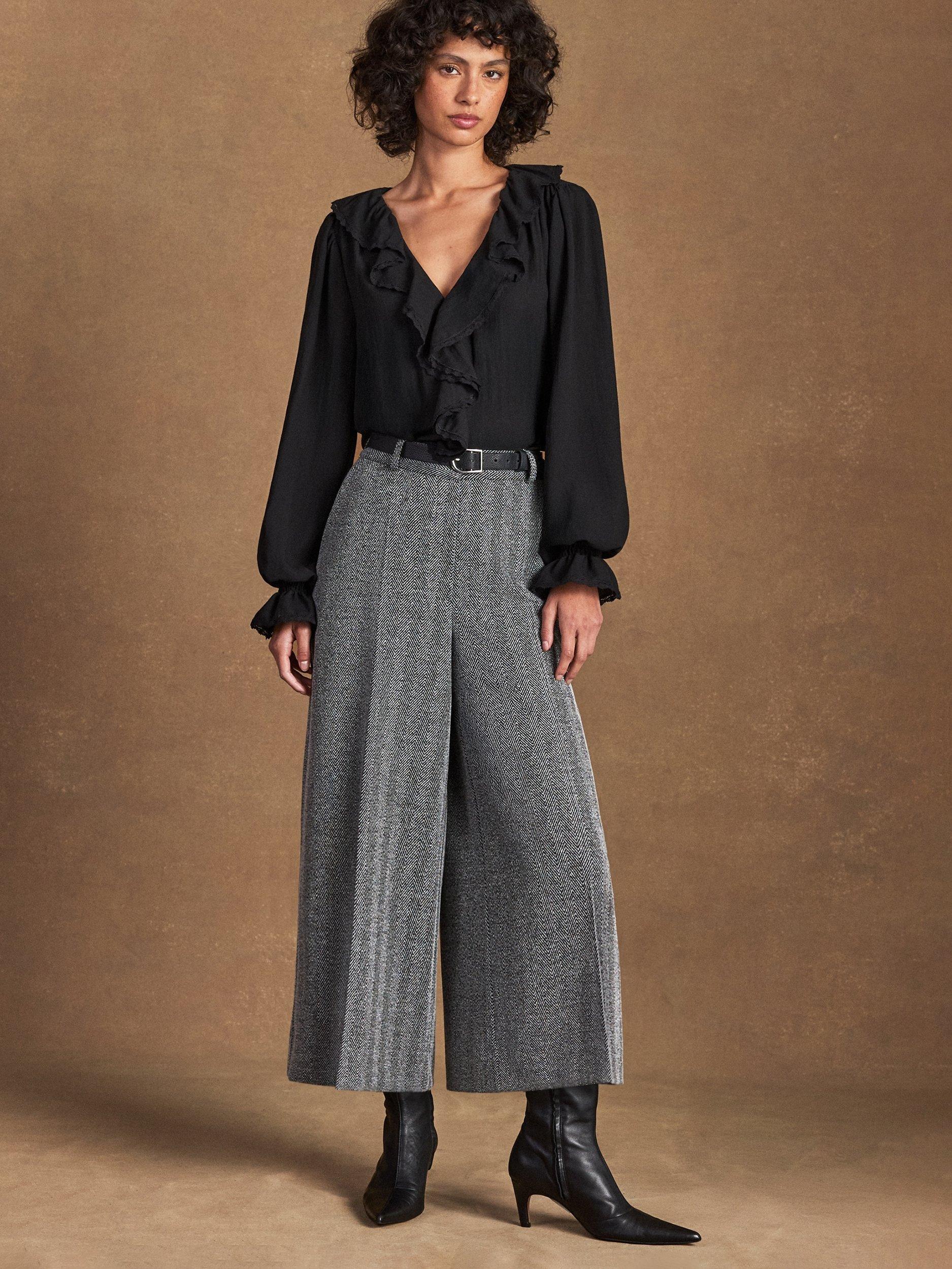 Product image 3 of 6, which shows Ro&Zo V-Neck Ruffle Front Top, Black, 6