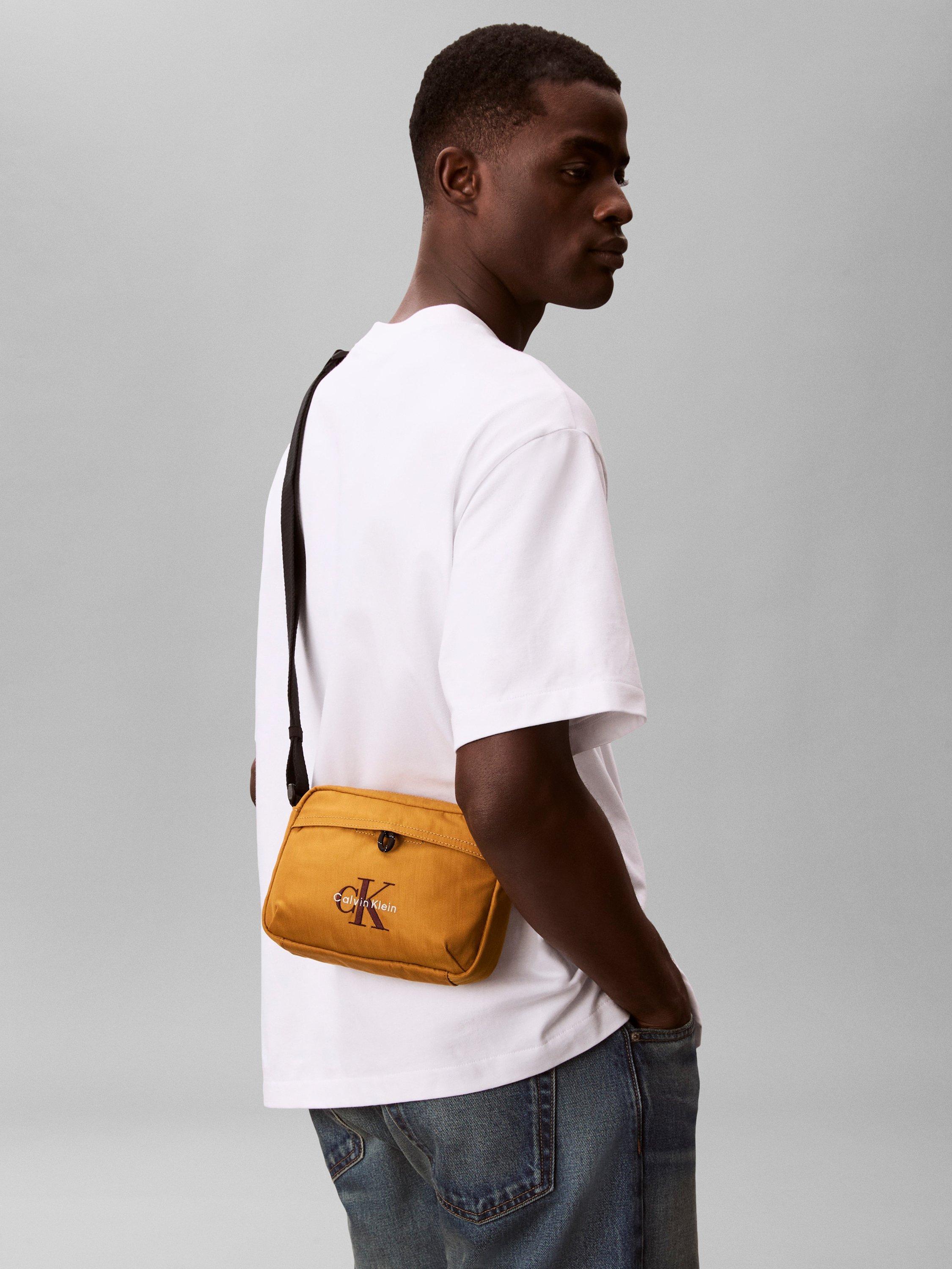 Product image 5 of 5, which shows Calvin Klein Bold Logo Nylon Camera Bag, Field Moss, One Size