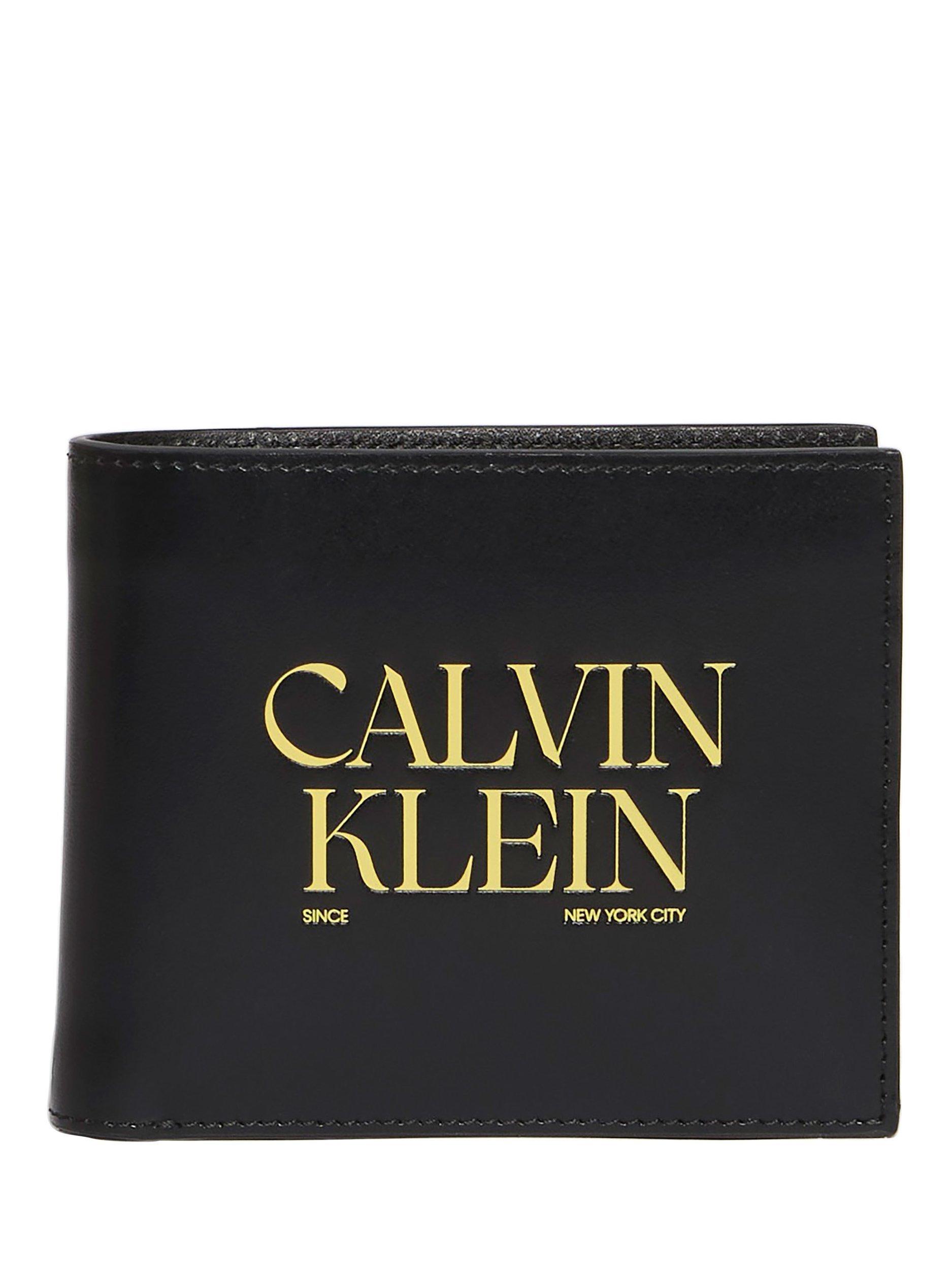 Product image 1 of 4, which shows Calvin Klein Logo Leather Wallet, Black, One Size